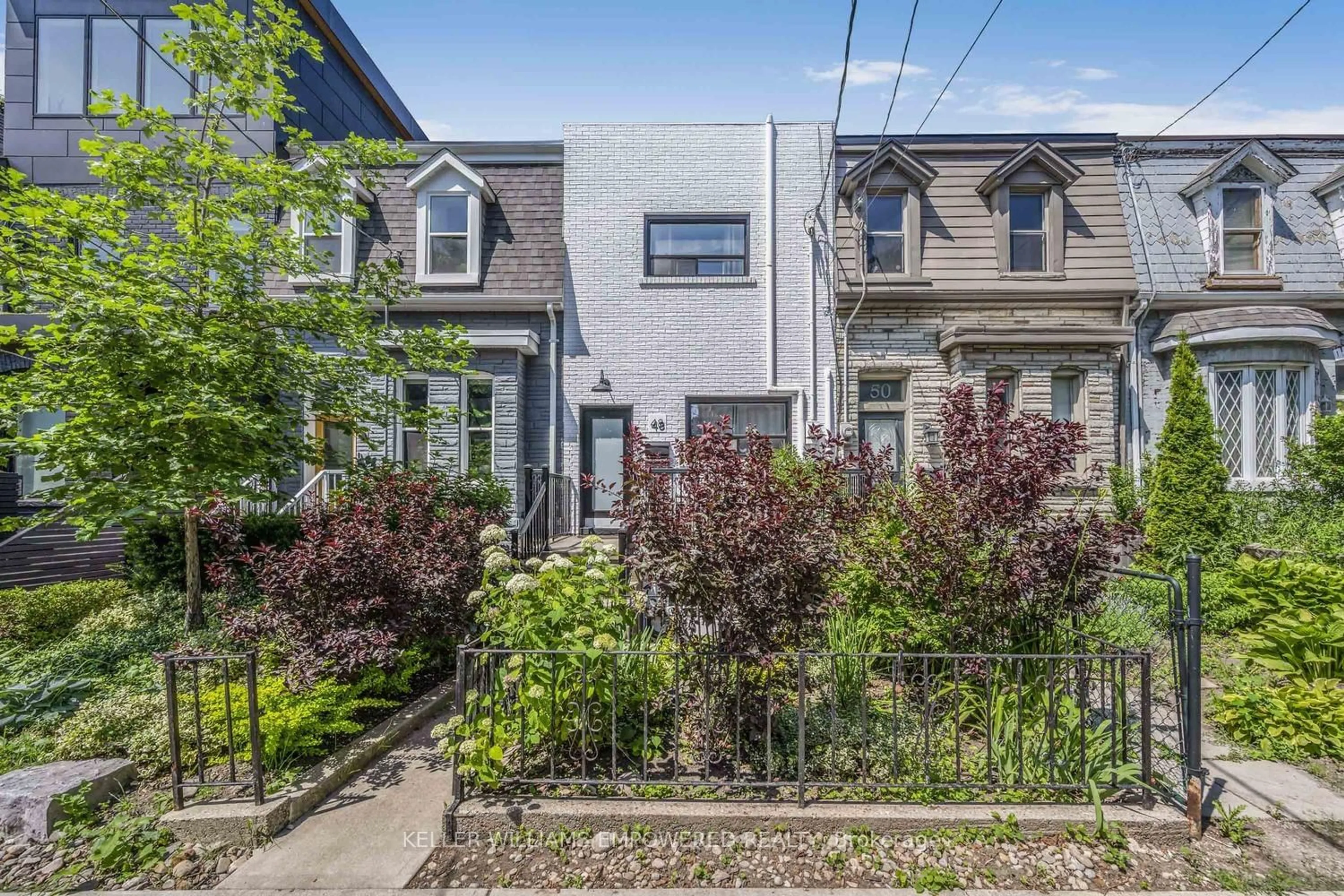 Home with brick exterior material, street for 48 Massey St, Toronto Ontario M6J 2T4
