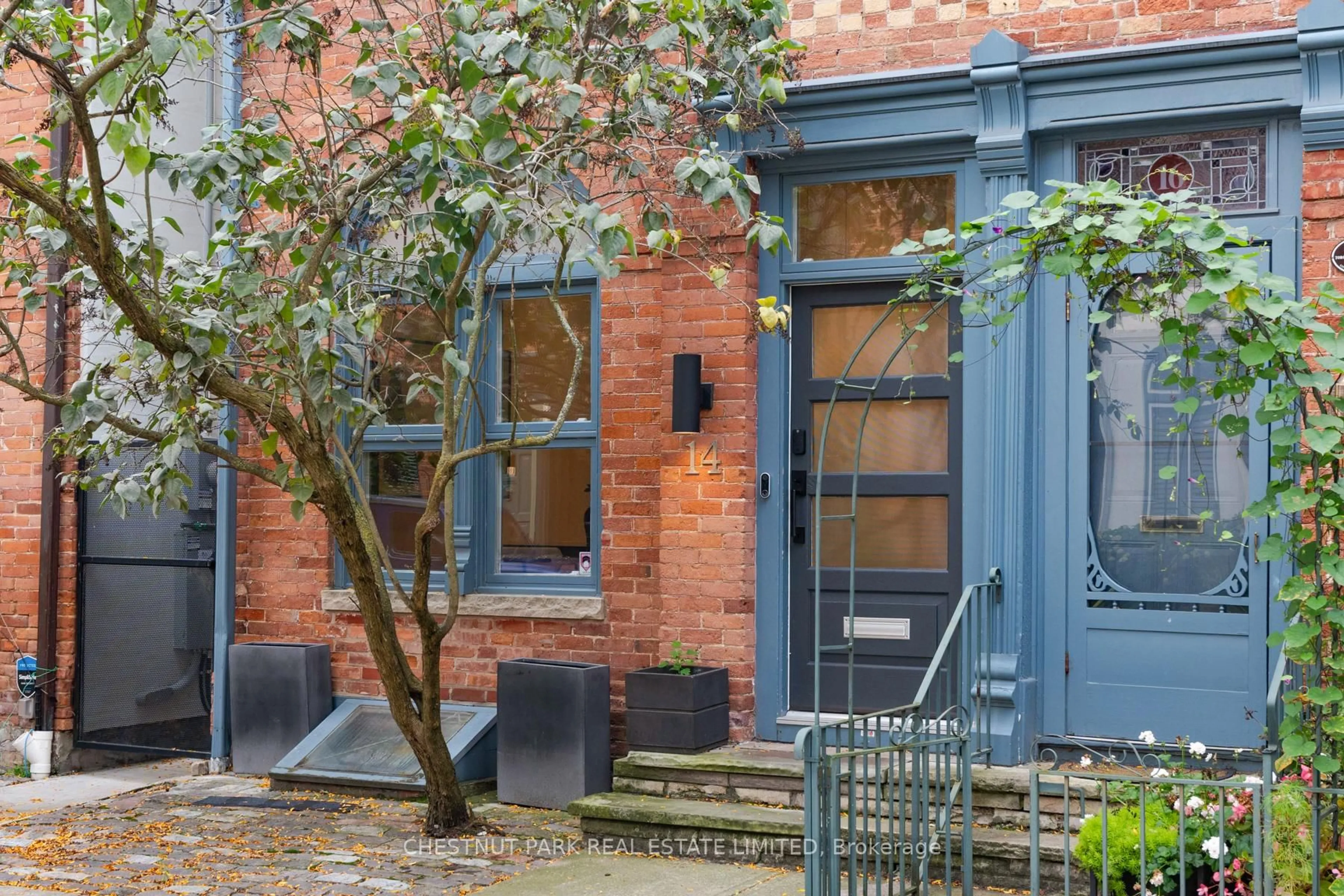 Home with brick exterior material, street for 14 Wellesley Ave, Toronto Ontario M4X 1V3