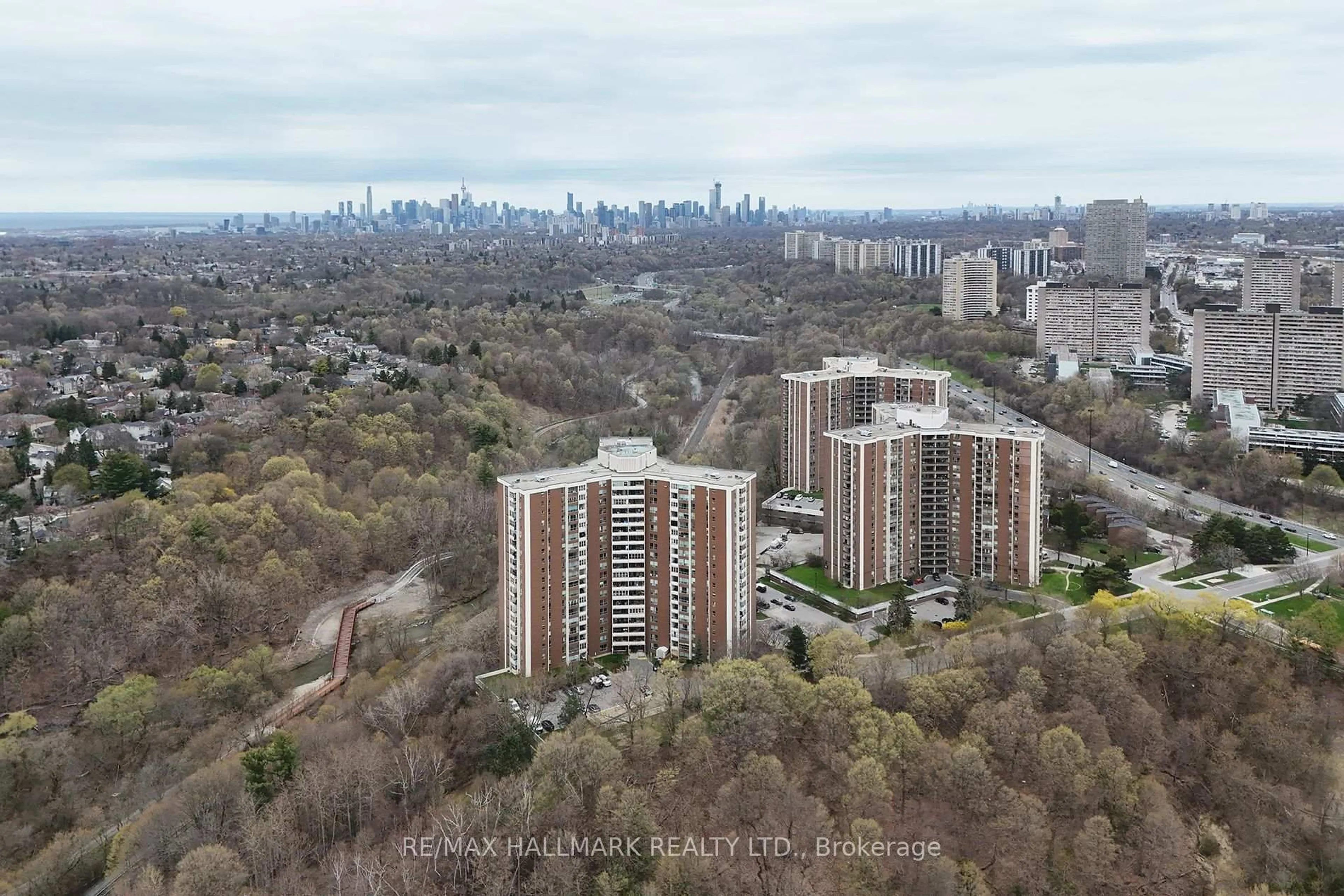 A pic from outside/outdoor area/front of a property/back of a property/a pic from drone, city buildings view from balcony for 60 Pavane Linkway Way #1704, Toronto Ontario M3C 2Y6