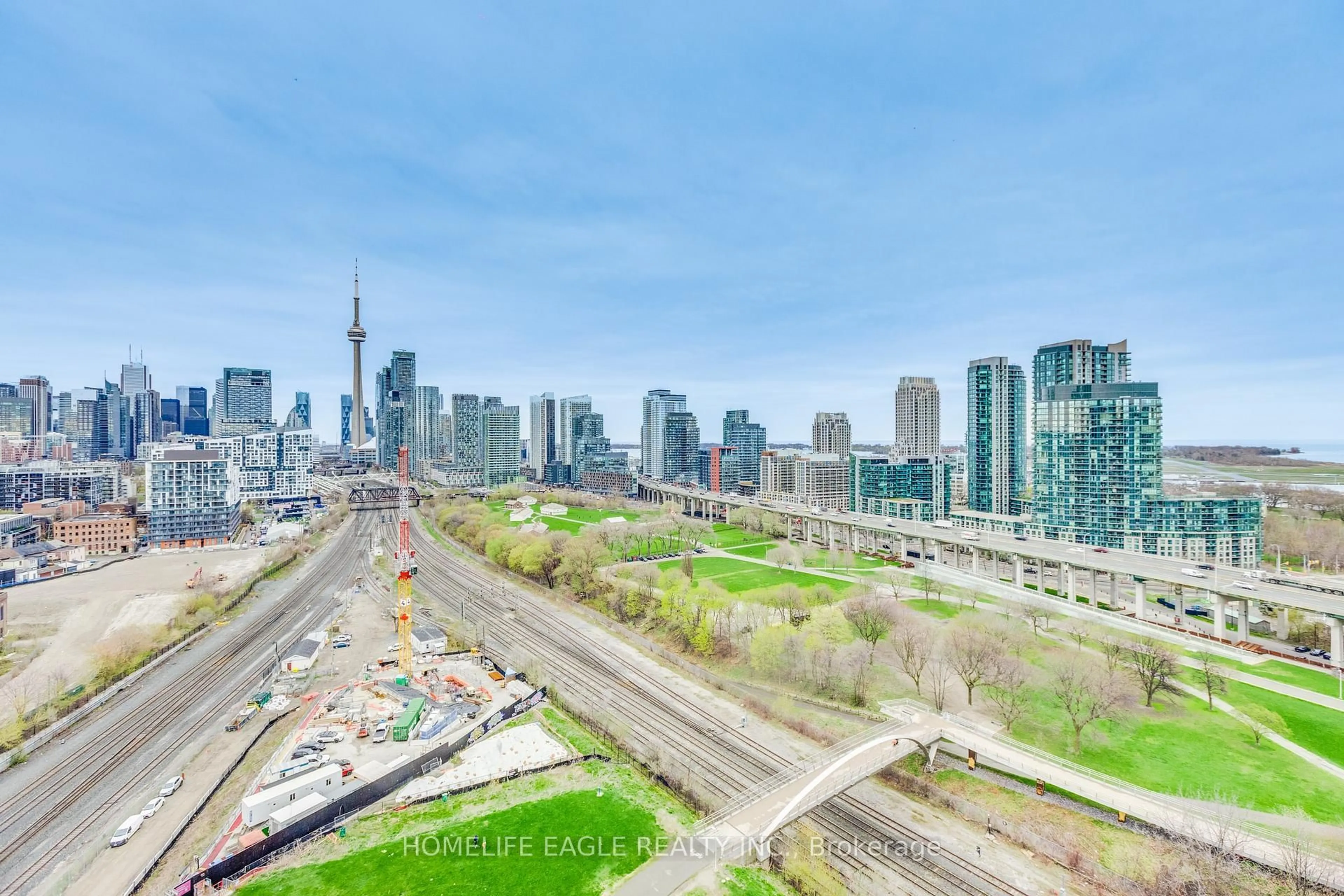 A pic from outside/outdoor area/front of a property/back of a property/a pic from drone, city buildings view from balcony for 30 Ordnance St #1811, Toronto Ontario M6K 0C8
