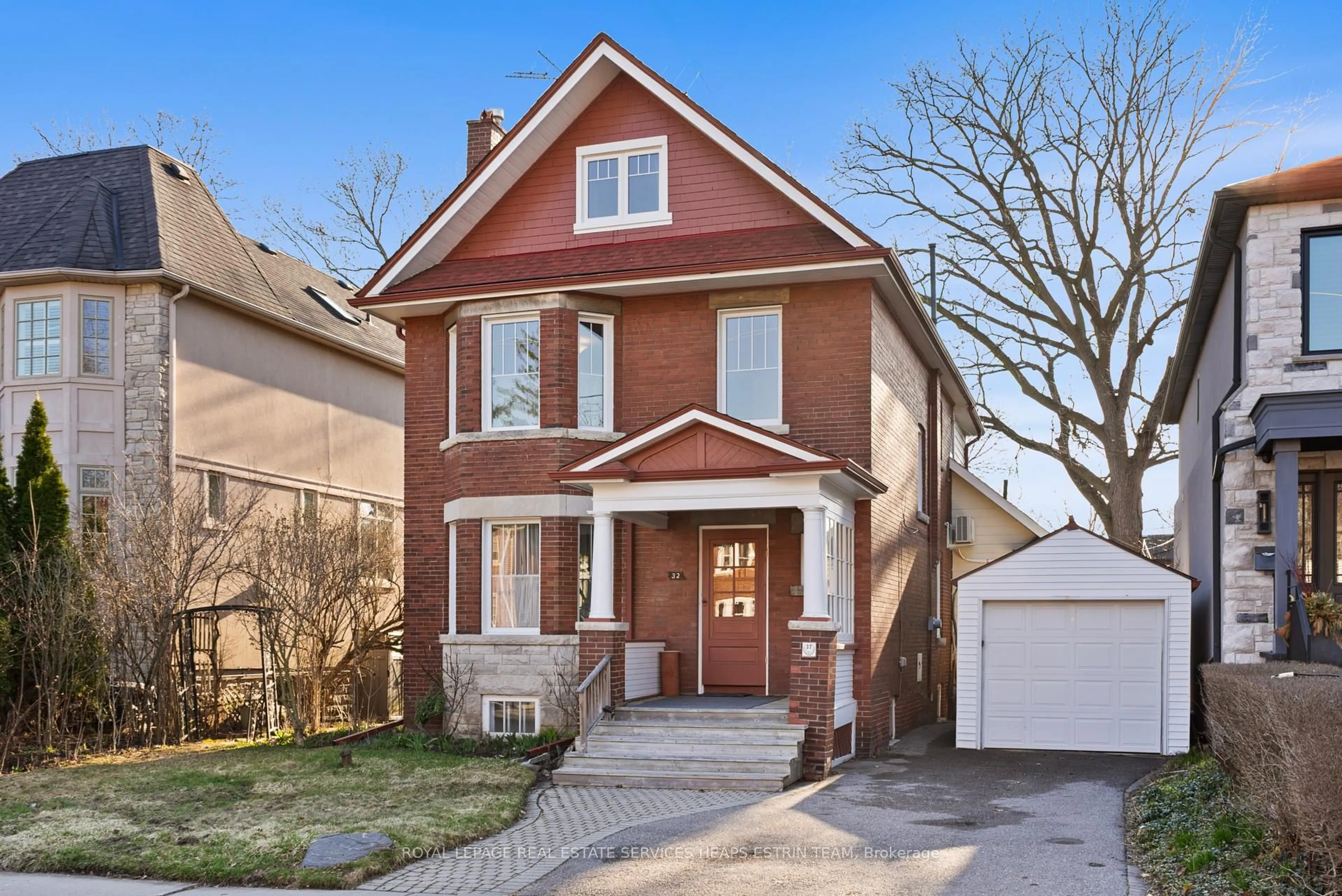 Home with brick exterior material, street for 32 Belcourt Rd, Toronto Ontario M4S 2T9