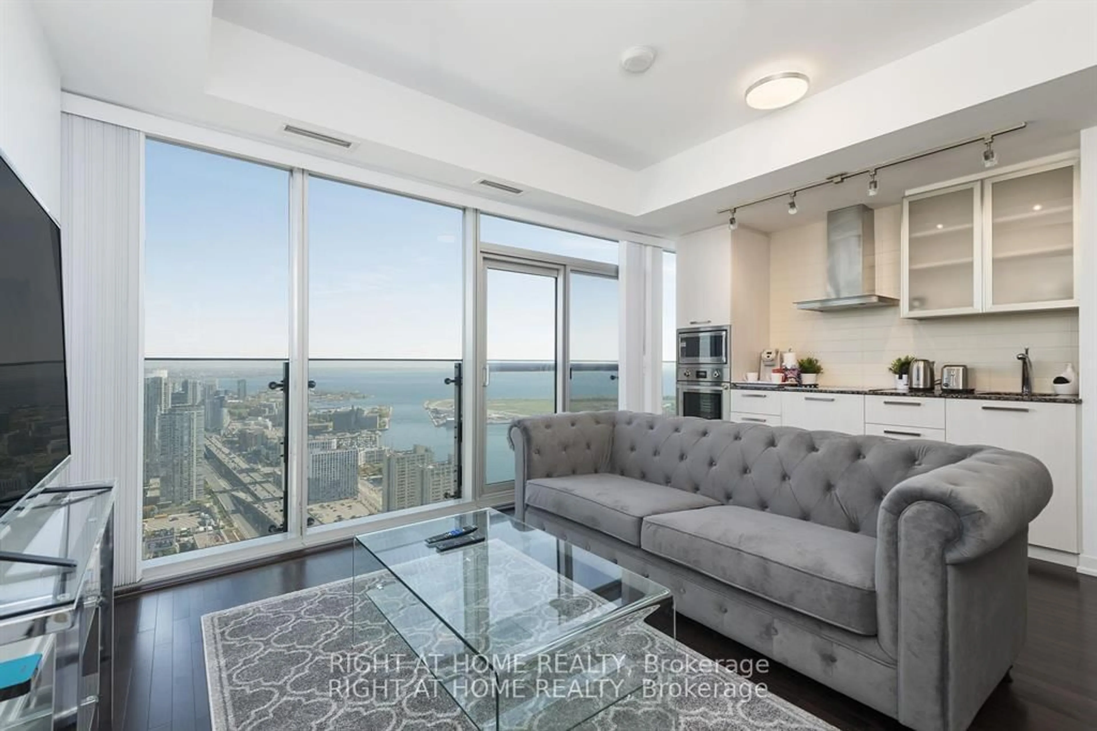 Living room with furniture, unknown for 12 York St #4906, Toronto Ontario M5J 2Z2