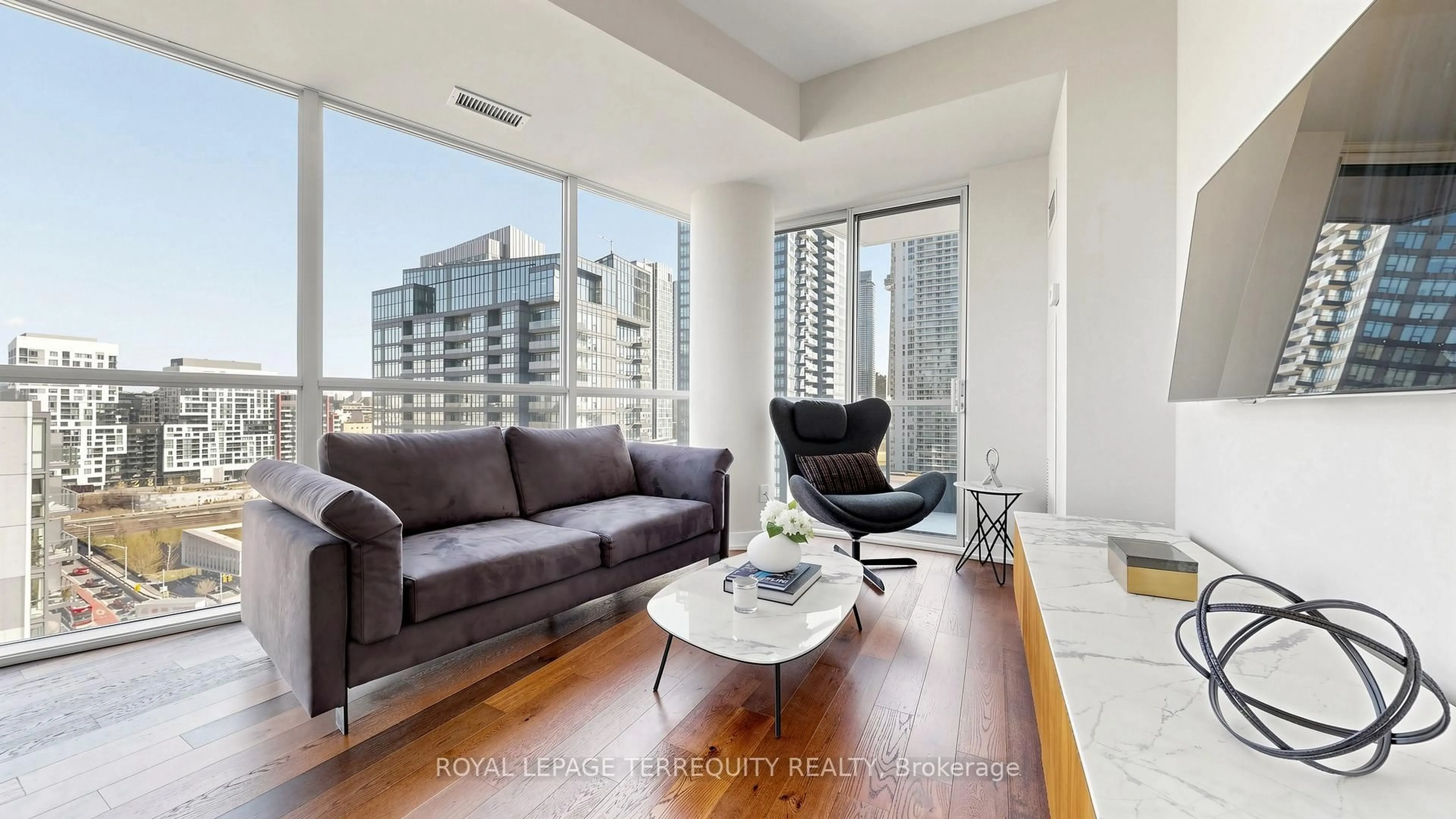 Living room with furniture, wood/laminate floor for 20 Bruyeres Mews #1705, Toronto Ontario M5V 0G8