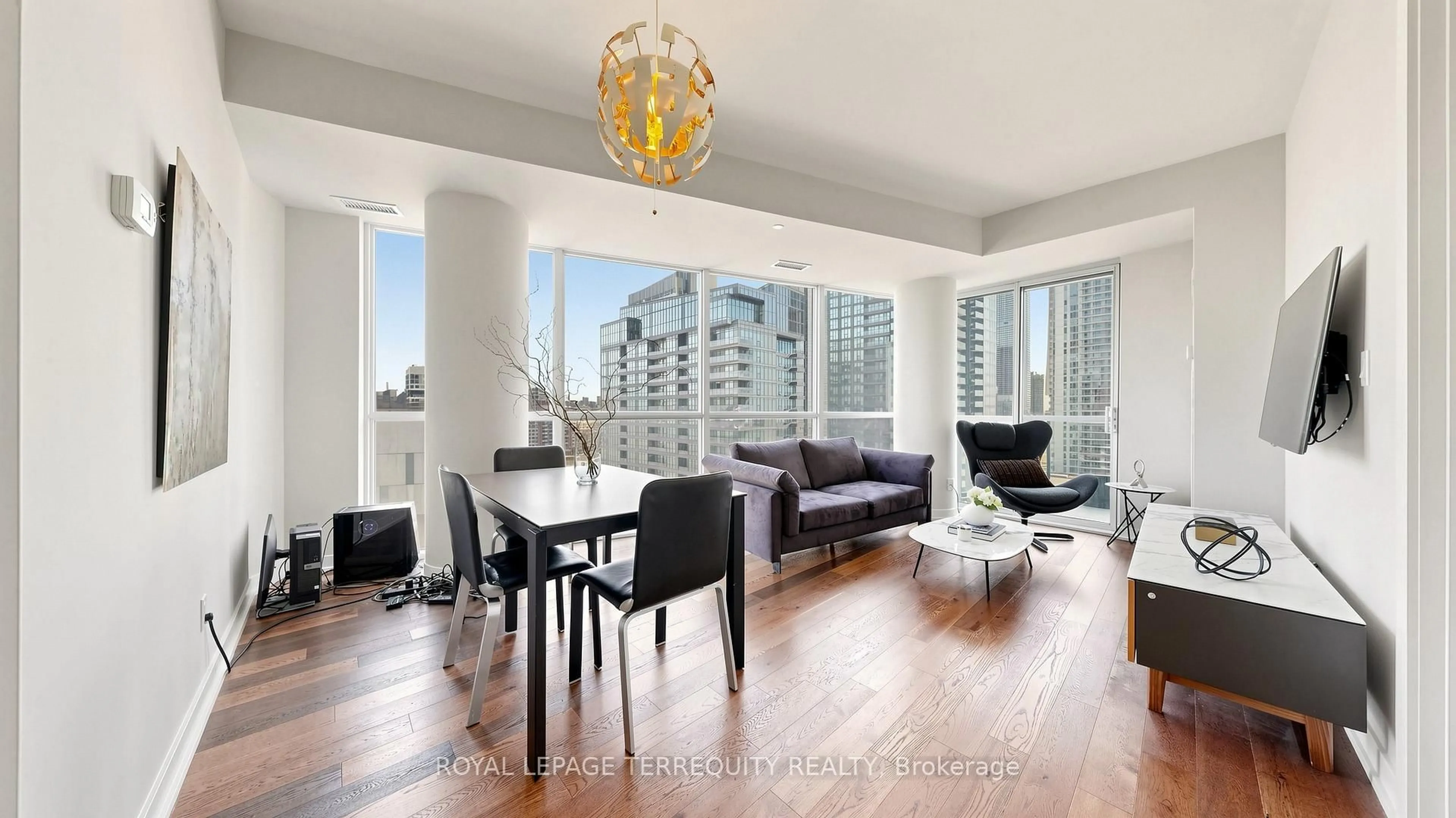 Living room with furniture, wood/laminate floor for 20 Bruyeres Mews #1705, Toronto Ontario M5V 0G8