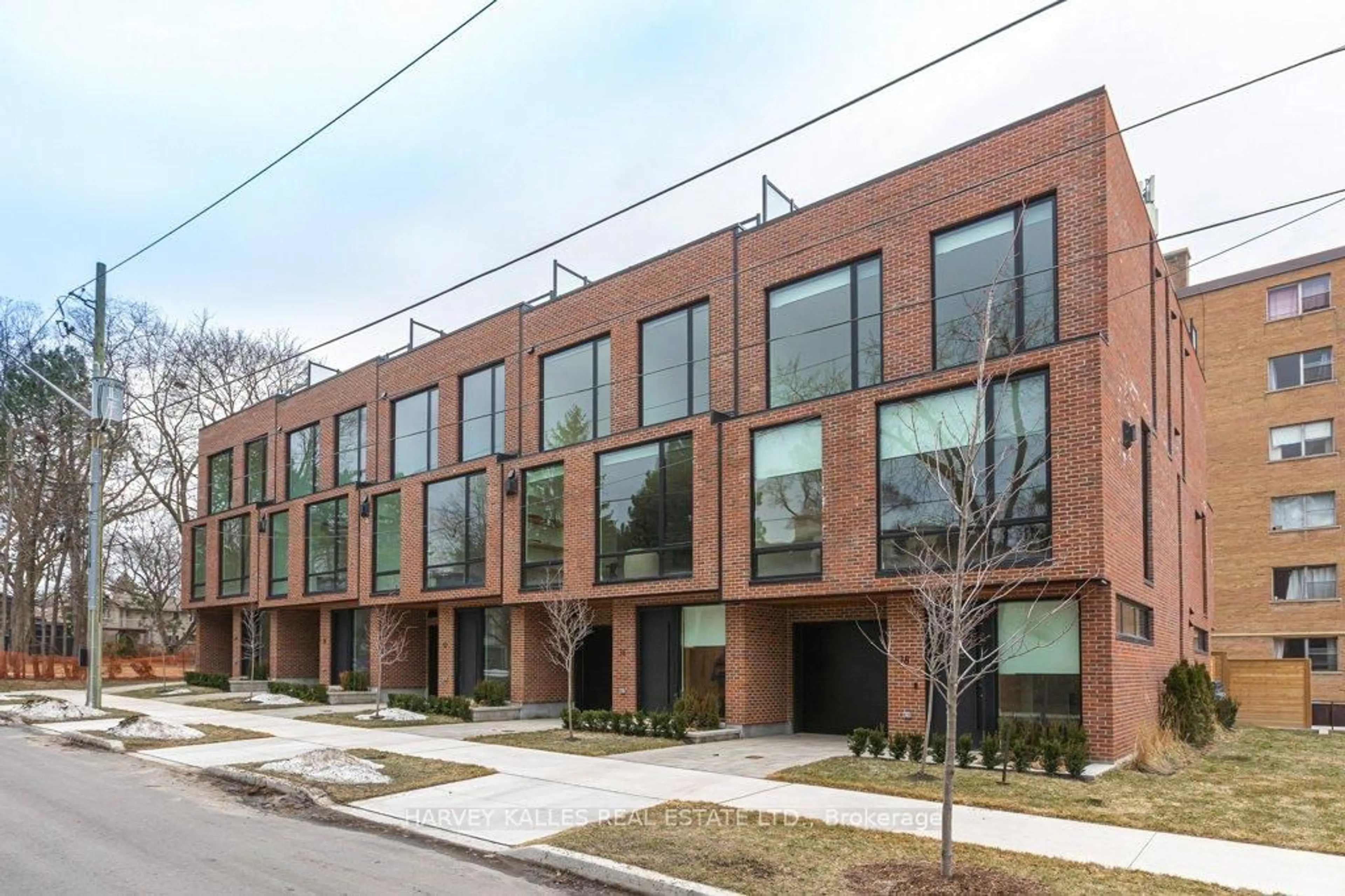 Home with brick exterior material, street for 32 Evergreen Gdns, Toronto Ontario M4G 1C5