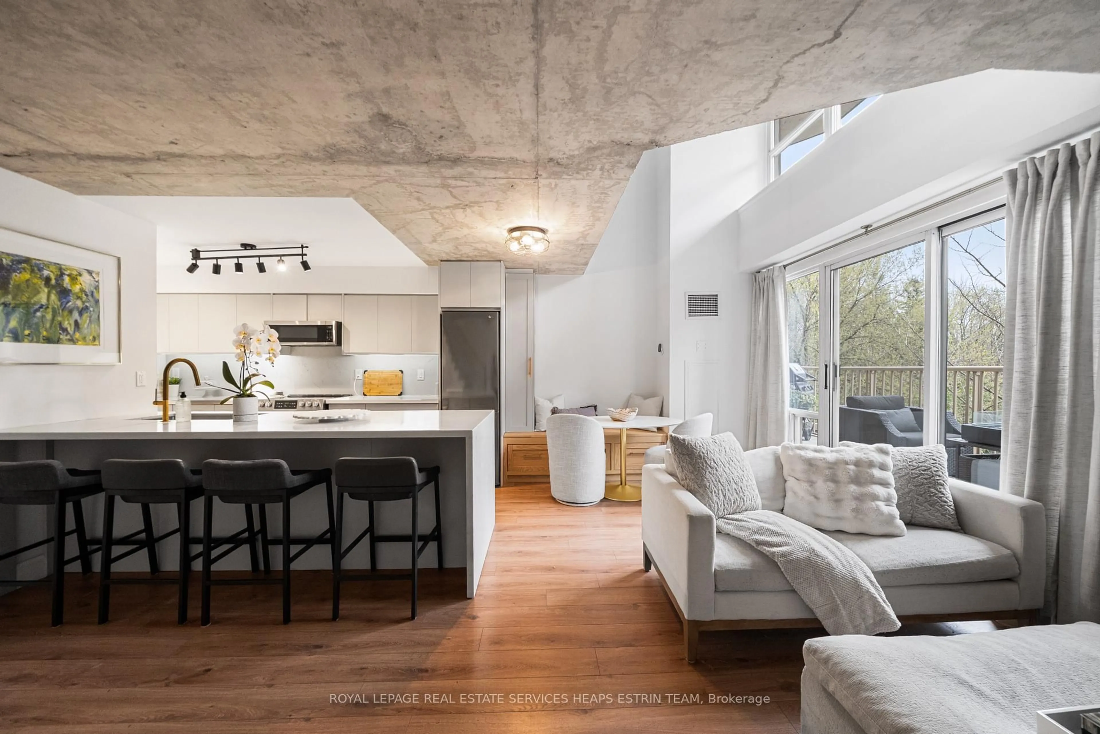 Open concept kitchen, cement floor for 119 Merton St #216, Toronto Ontario M4S 3G5
