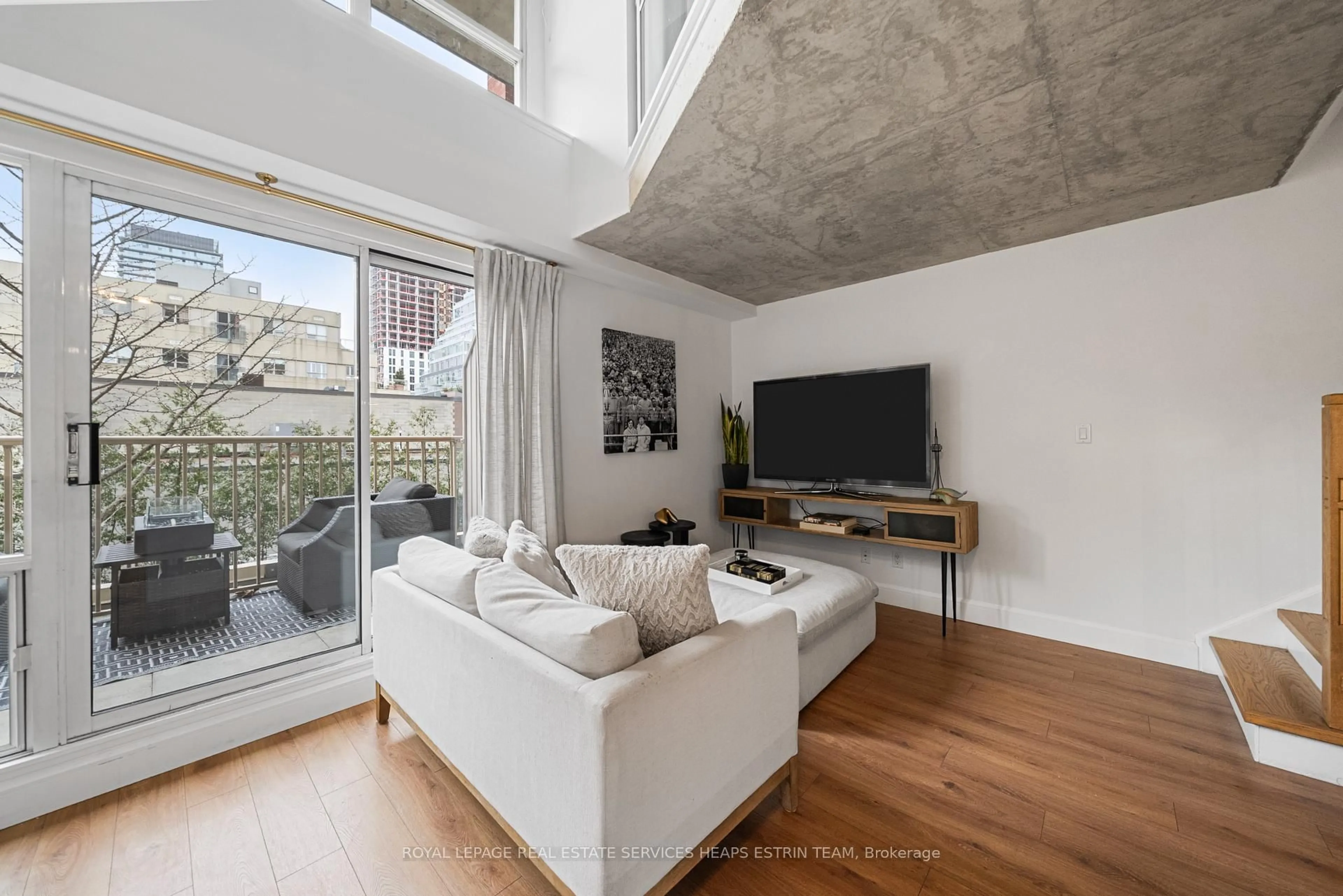 Living room with furniture, cement floor for 119 Merton St #216, Toronto Ontario M4S 3G5