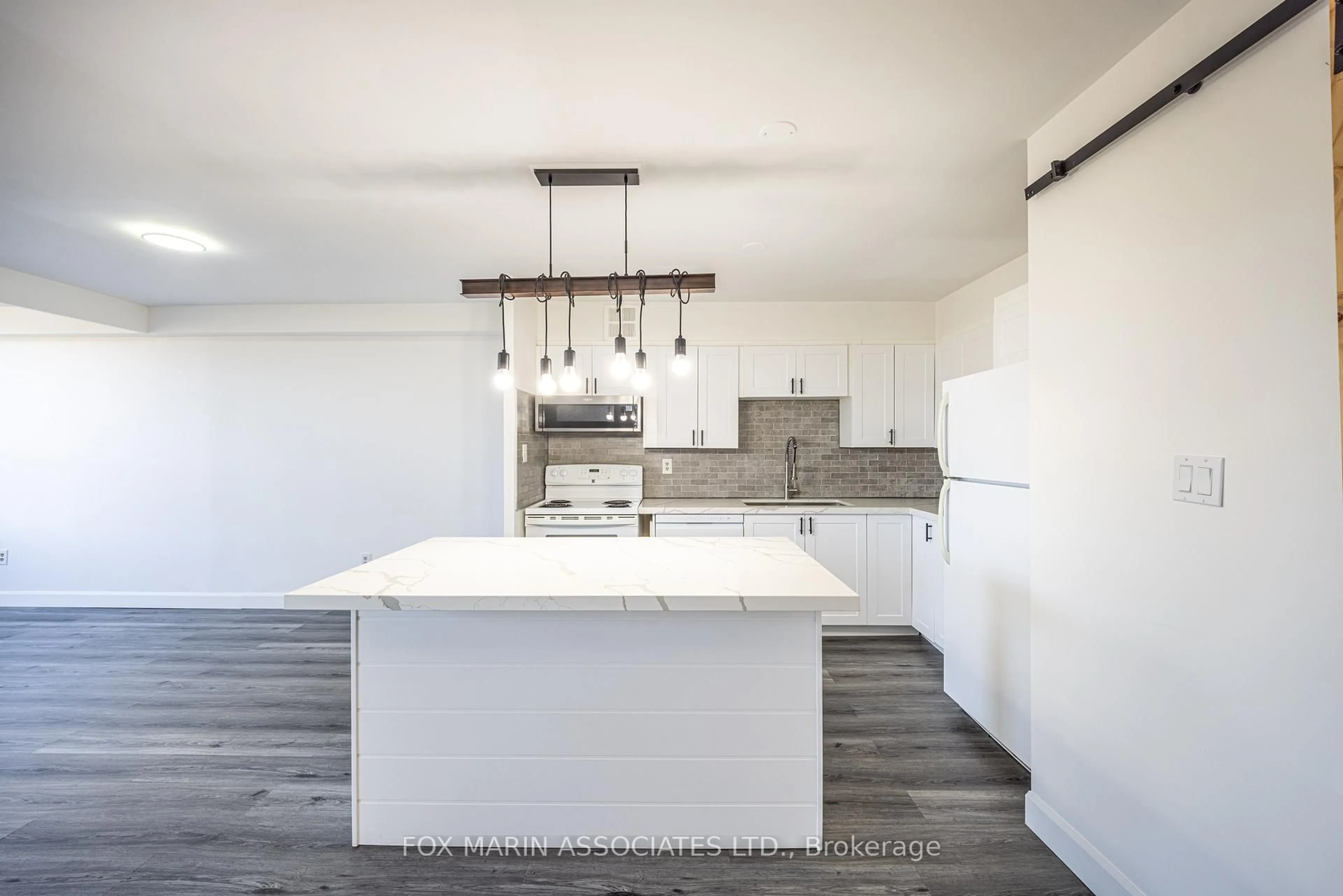 Open concept kitchen, unknown for 20 Edgecliff Gfwy #312, Toronto Ontario M3C 3A4
