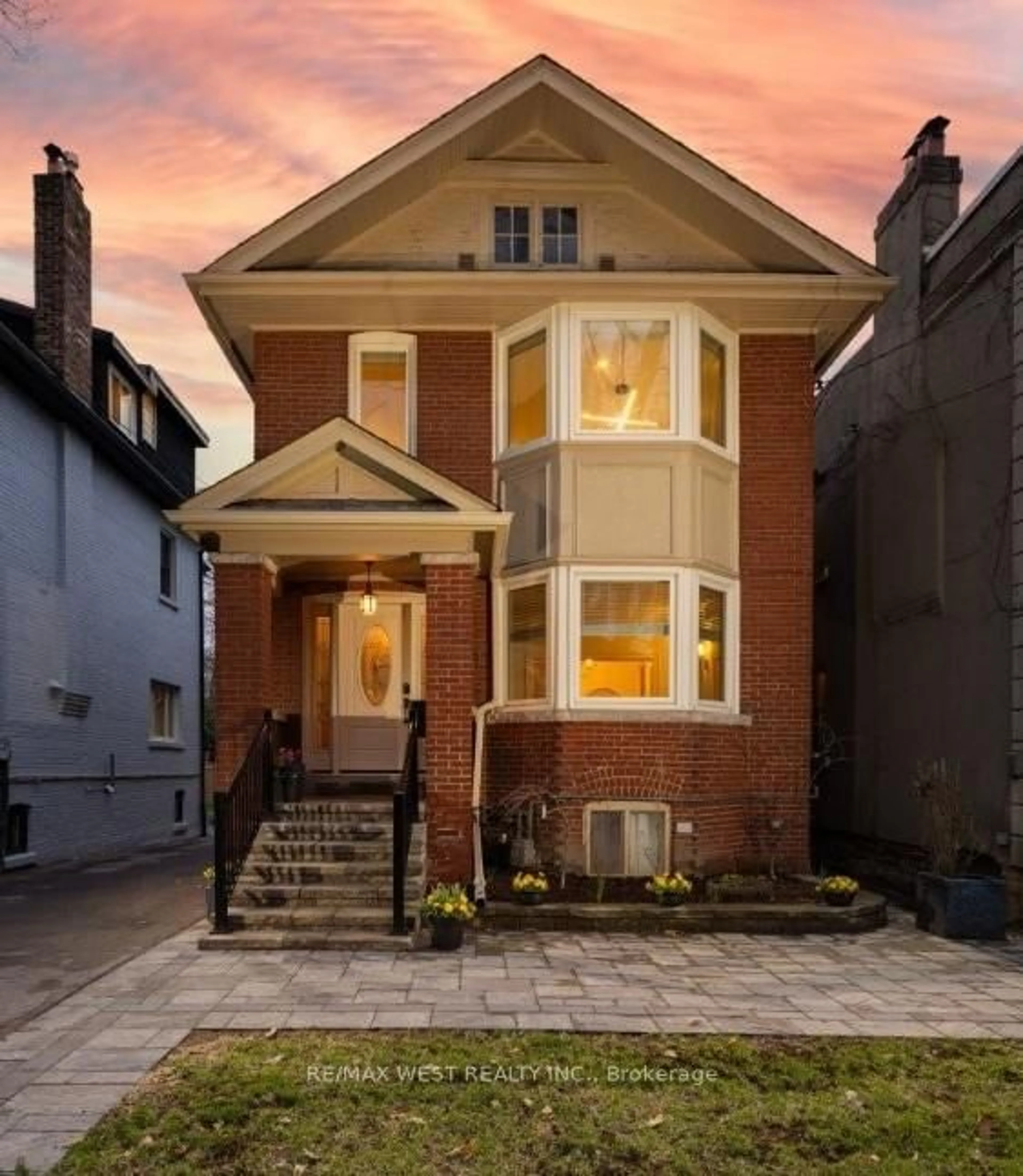 Home with brick exterior material, street for 311 St Clair Ave, Toronto Ontario M4T 1P3