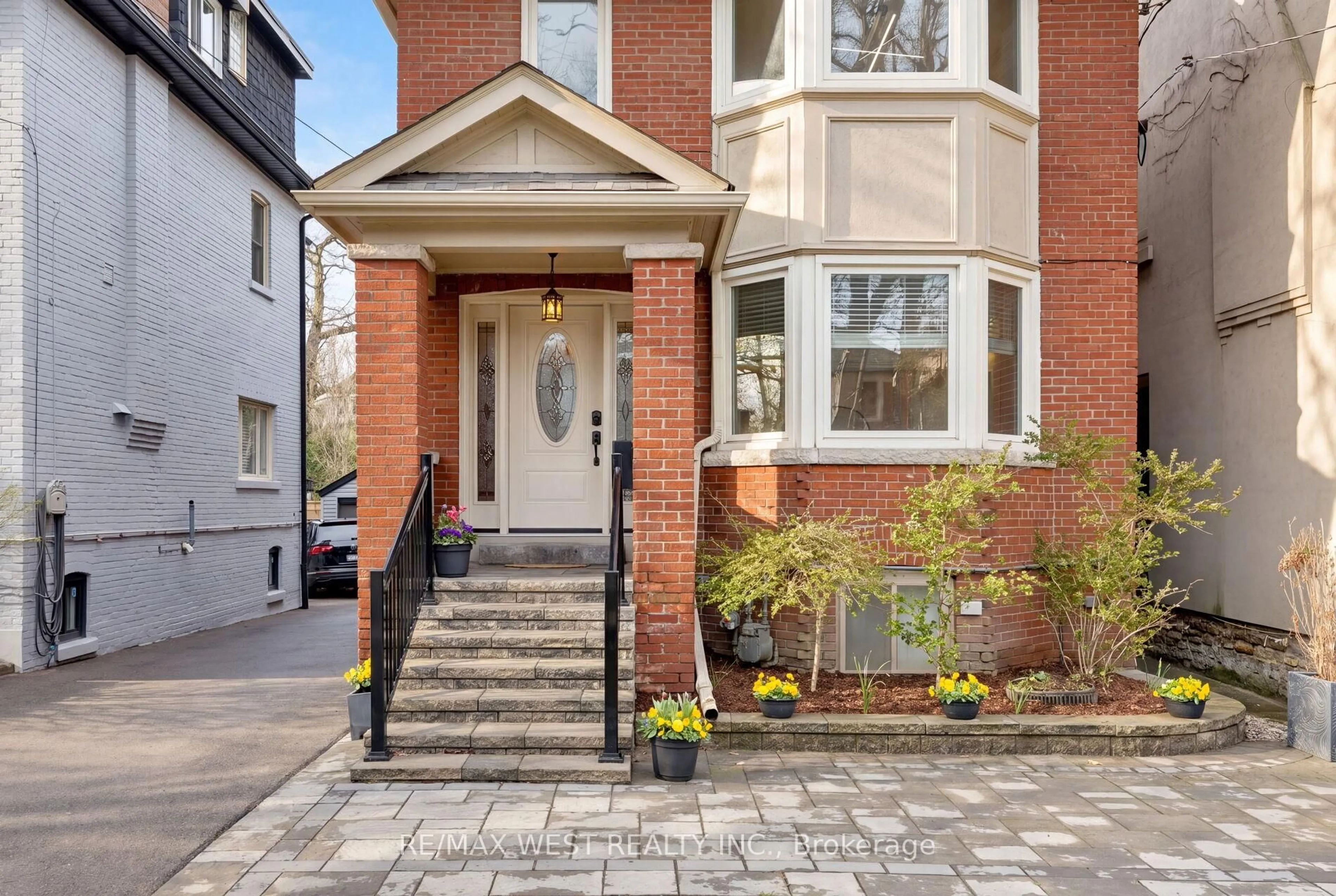 Home with brick exterior material, street for 311 St Clair Ave, Toronto Ontario M4T 1P3