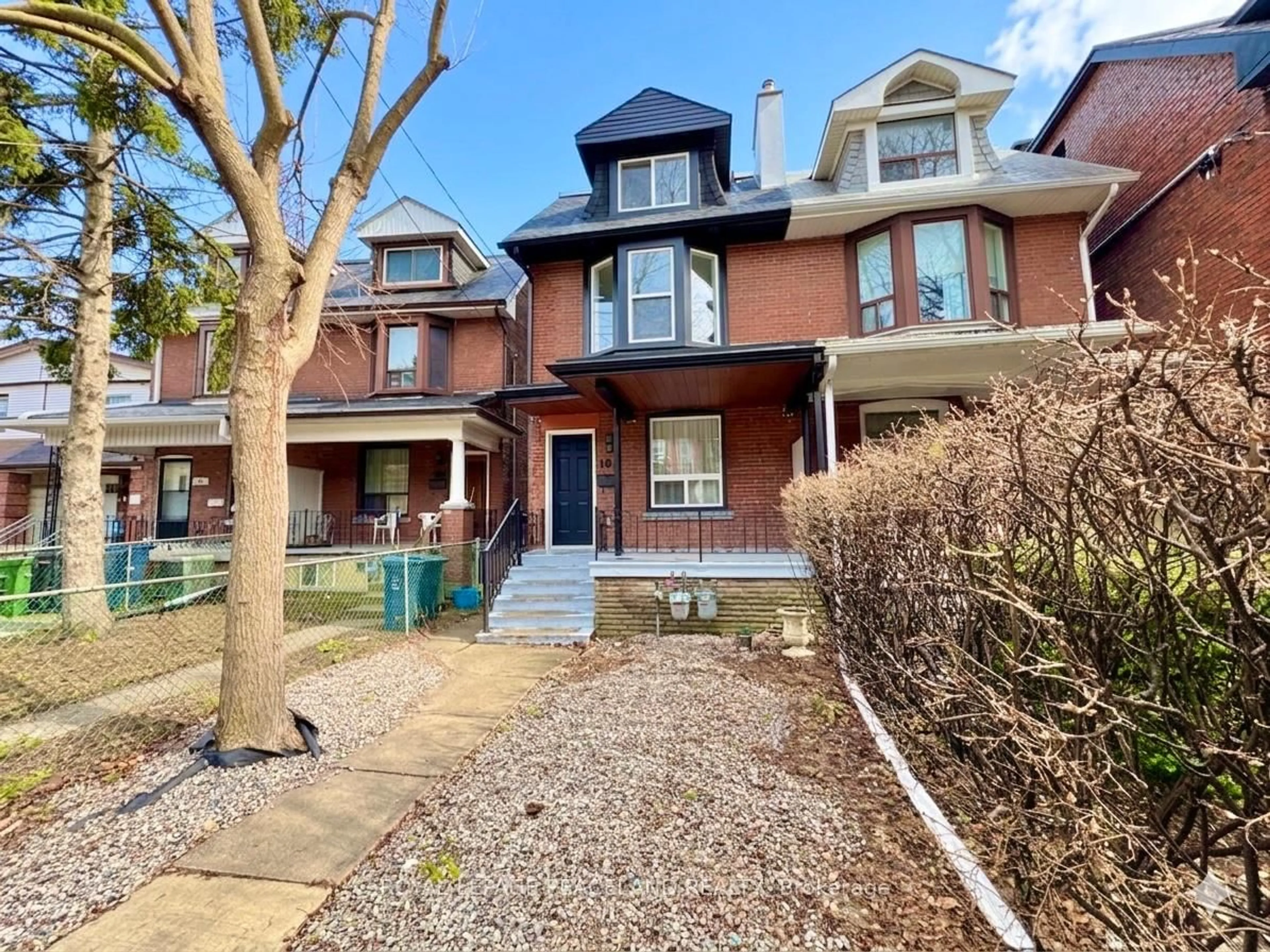 Home with brick exterior material, street for 101 Marchmount Rd, Toronto Ontario M6G 2B2