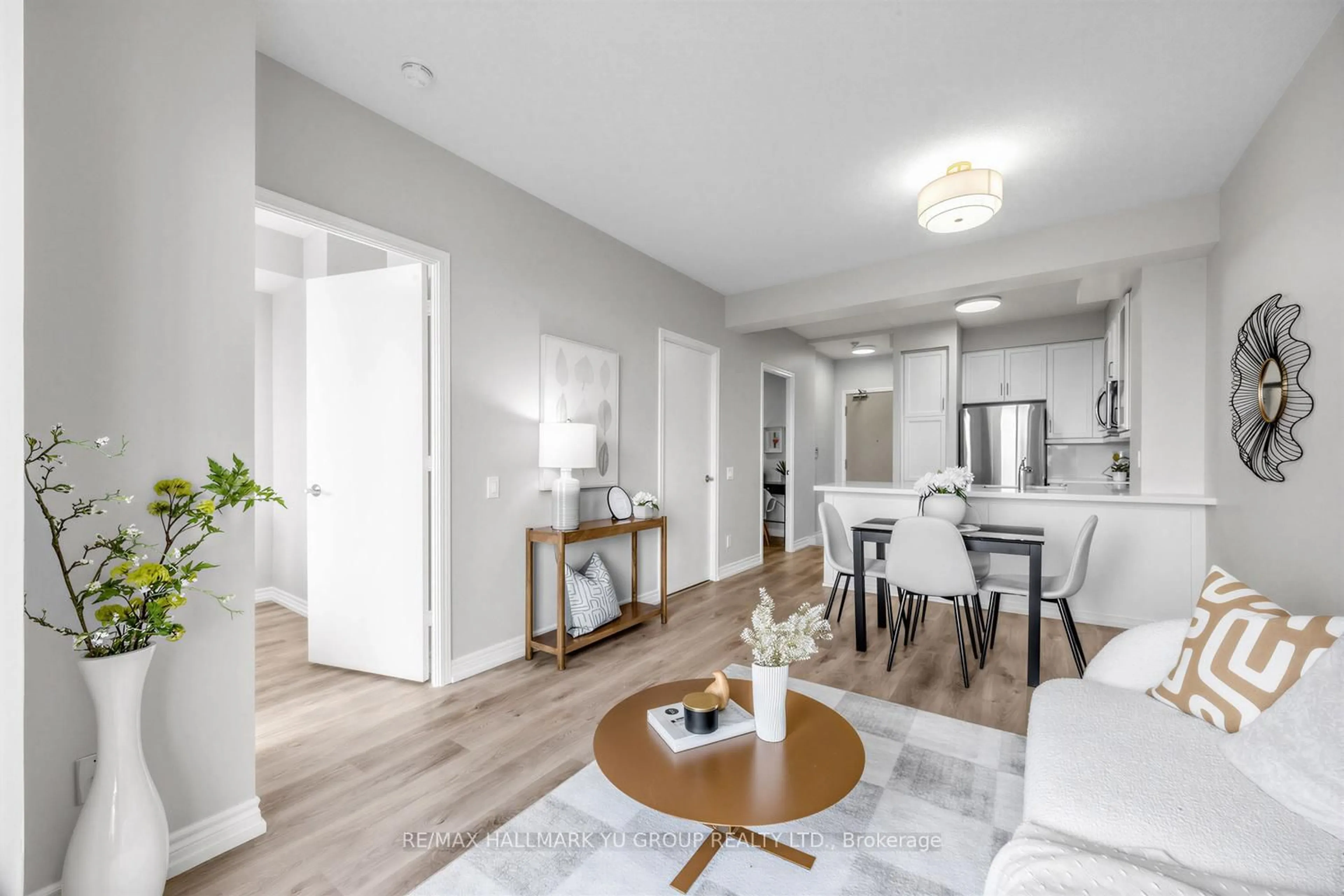 Open concept kitchen, wood/laminate floor for 60 Byng Ave #607, Toronto Ontario M2N 7K3