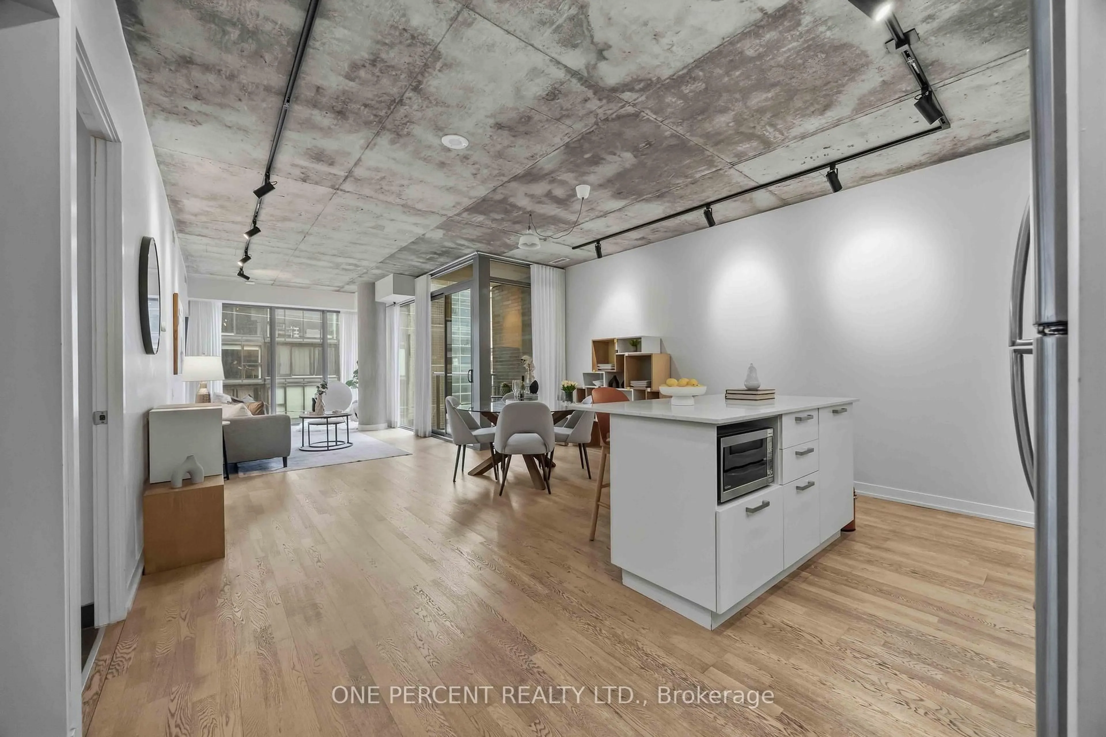 Open concept kitchen, cement floor for 650 King St #314, Toronto Ontario M5V 0H6