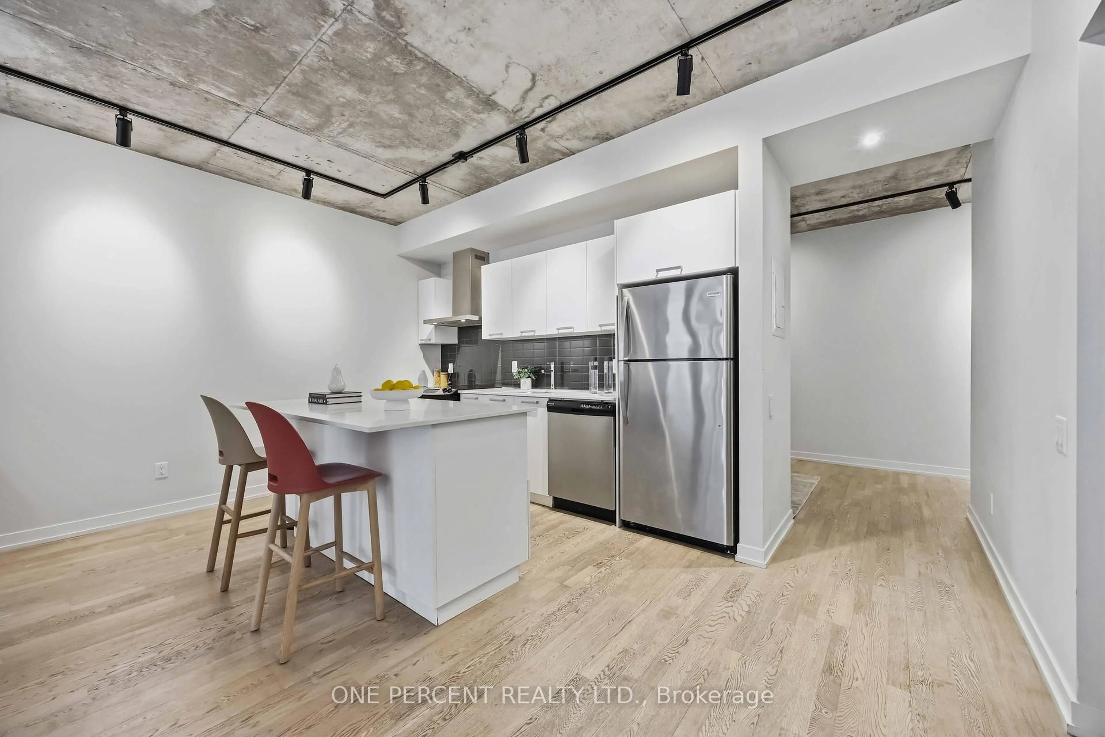 Open concept kitchen, cement floor for 650 King St #314, Toronto Ontario M5V 0H6
