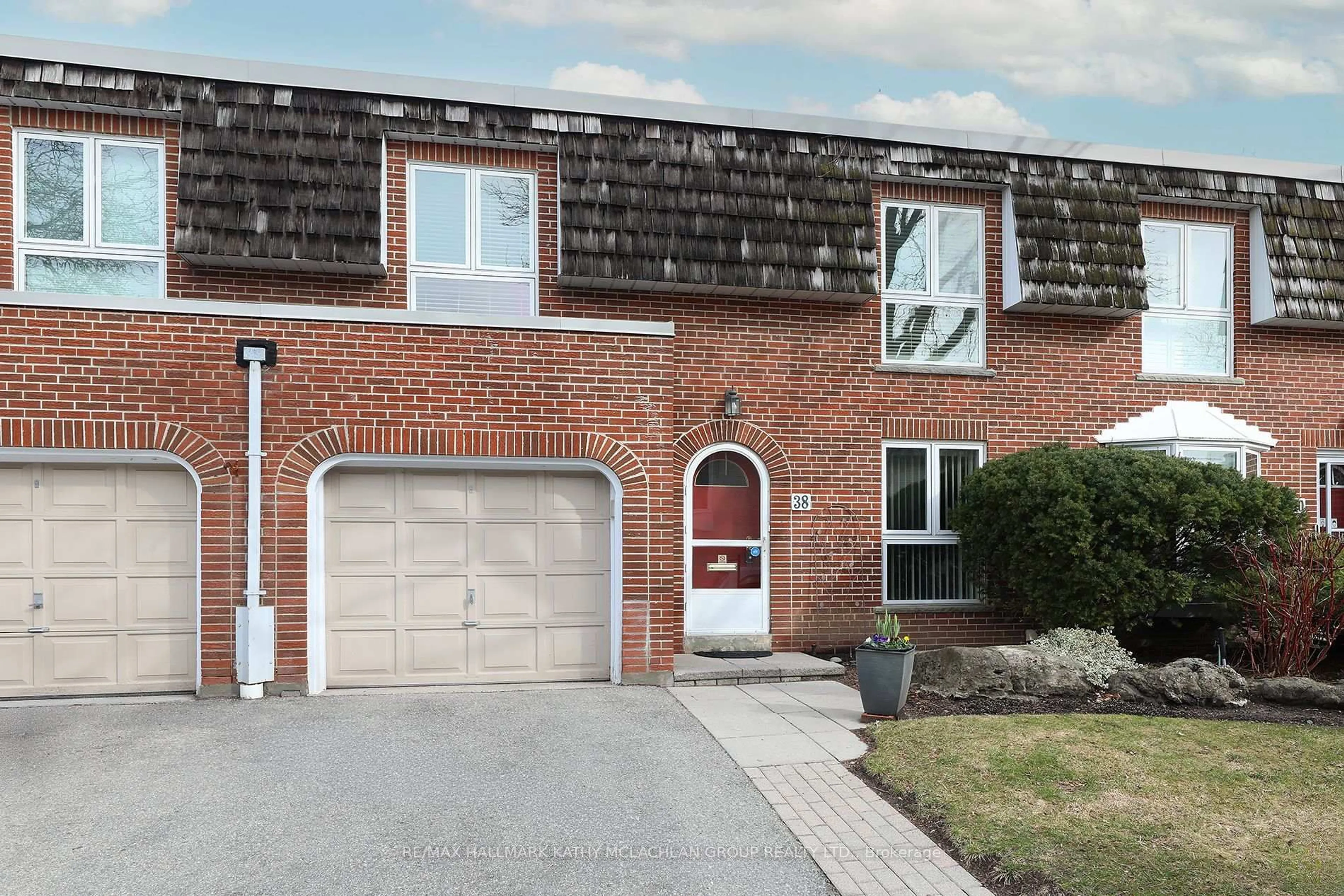 Home with brick exterior material, street for 38 Crimson Millway, Toronto Ontario M2L 1T6