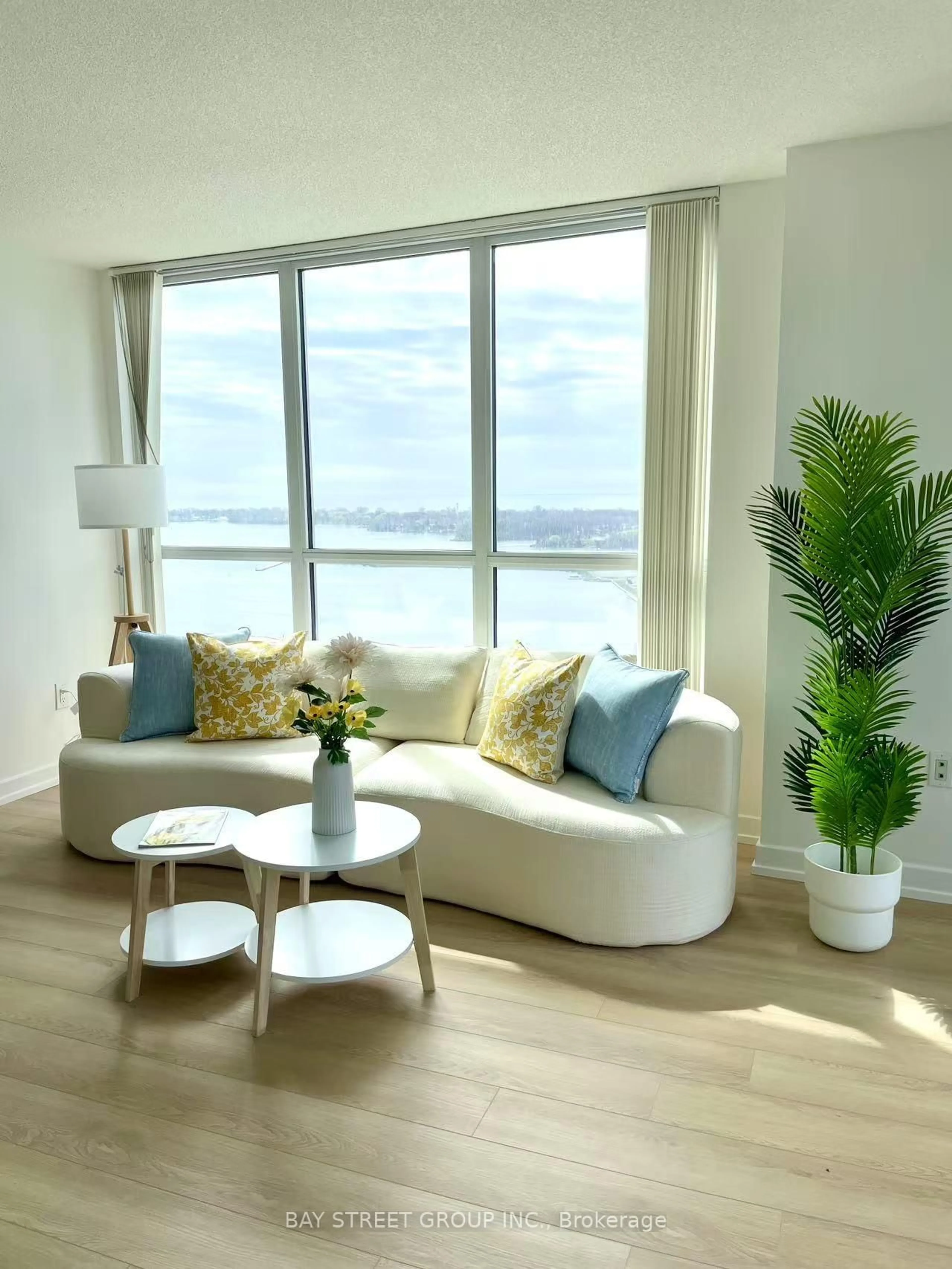 Living room with furniture, wood/laminate floor for 75 Queens Wharf Rd #2908, Toronto Ontario M5V 0J8