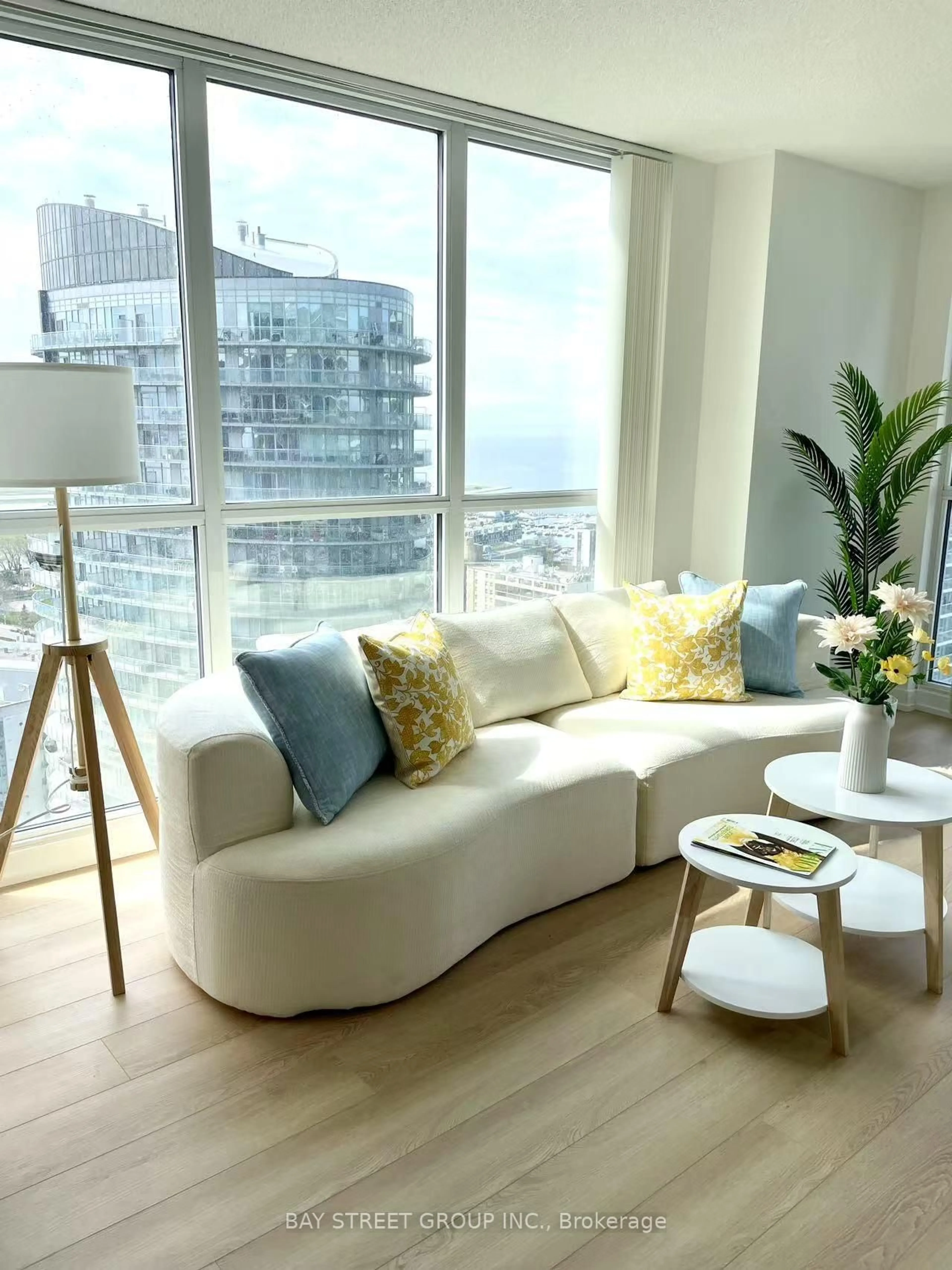 Living room with furniture, wood/laminate floor for 75 Queens Wharf Rd #2908, Toronto Ontario M5V 0J8