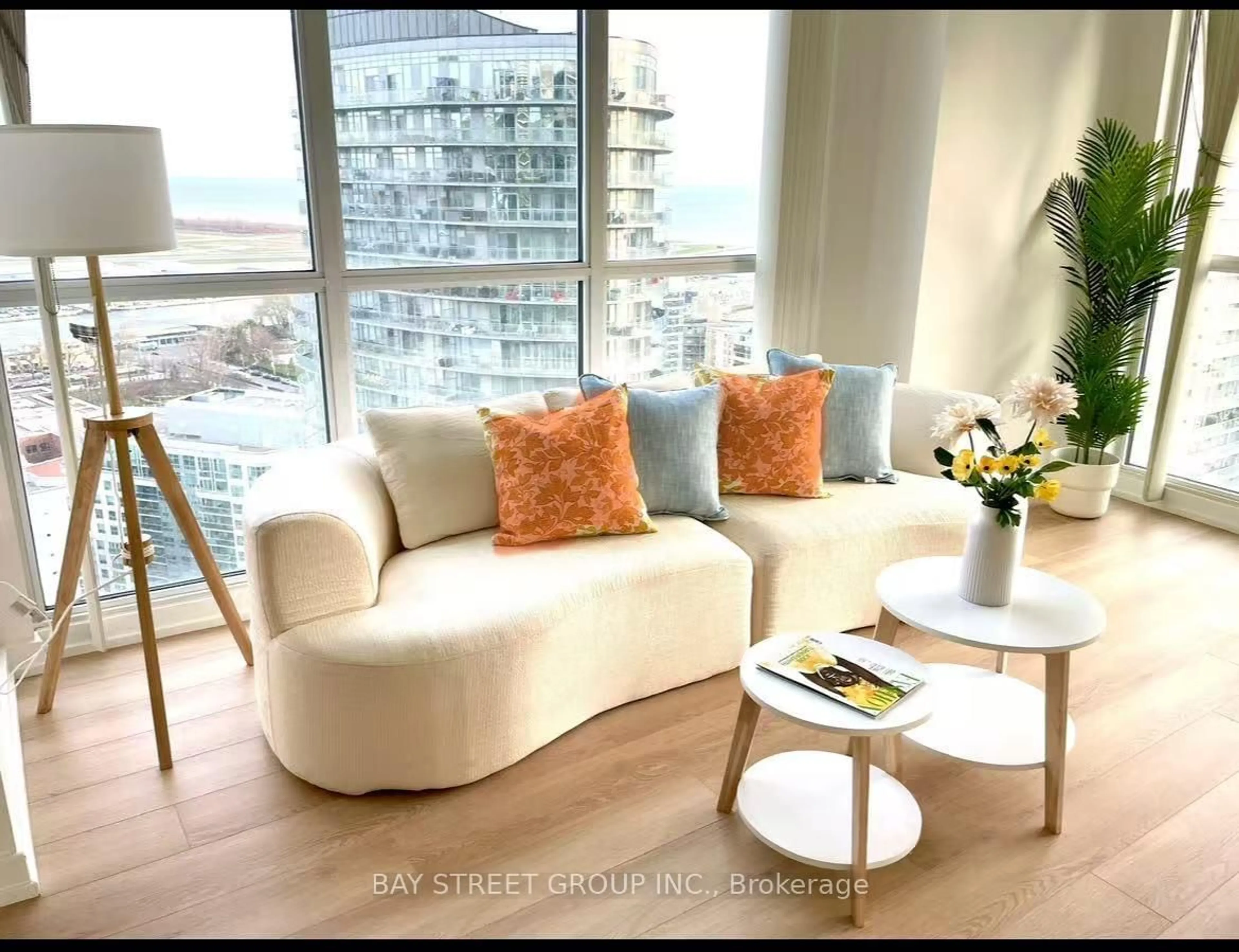 Living room with furniture, wood/laminate floor for 75 Queens Wharf Rd #2908, Toronto Ontario M5V 0J8
