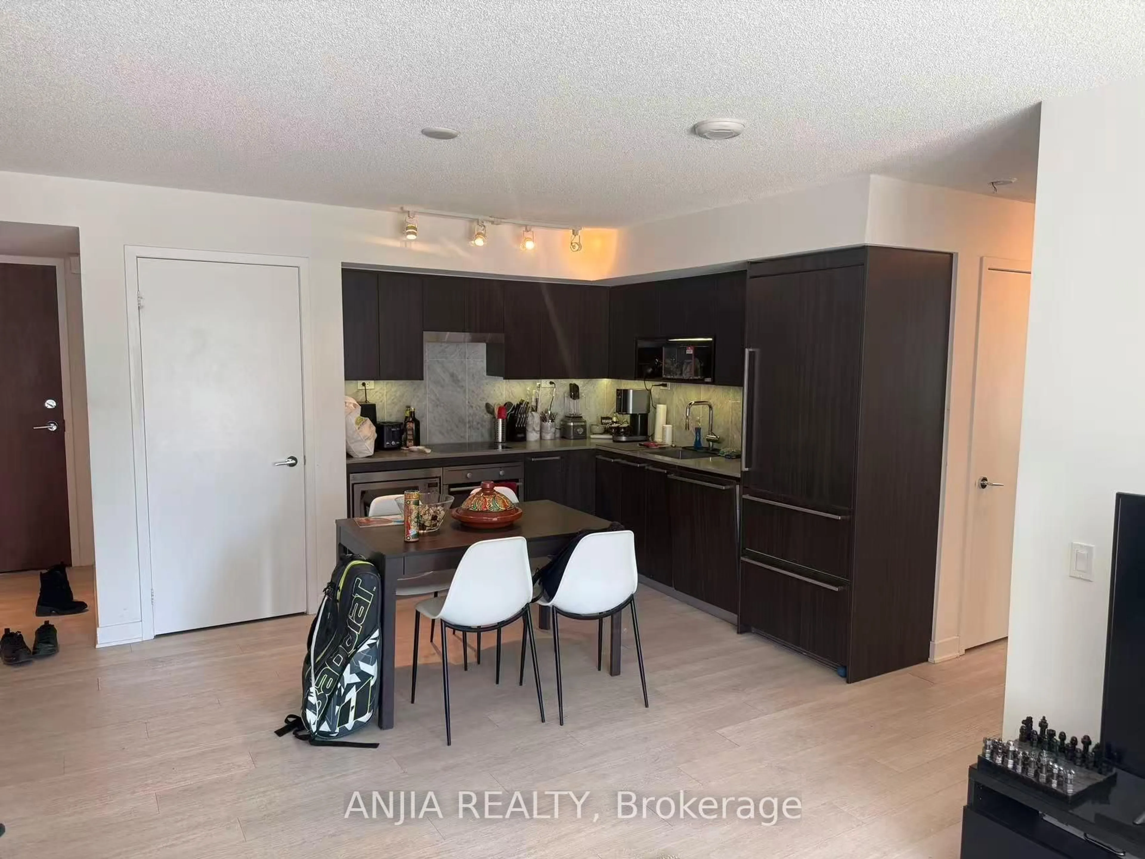 Open concept kitchen, unknown for 70 Queens Wharf Rd #212, Toronto Ontario M5V 0J2