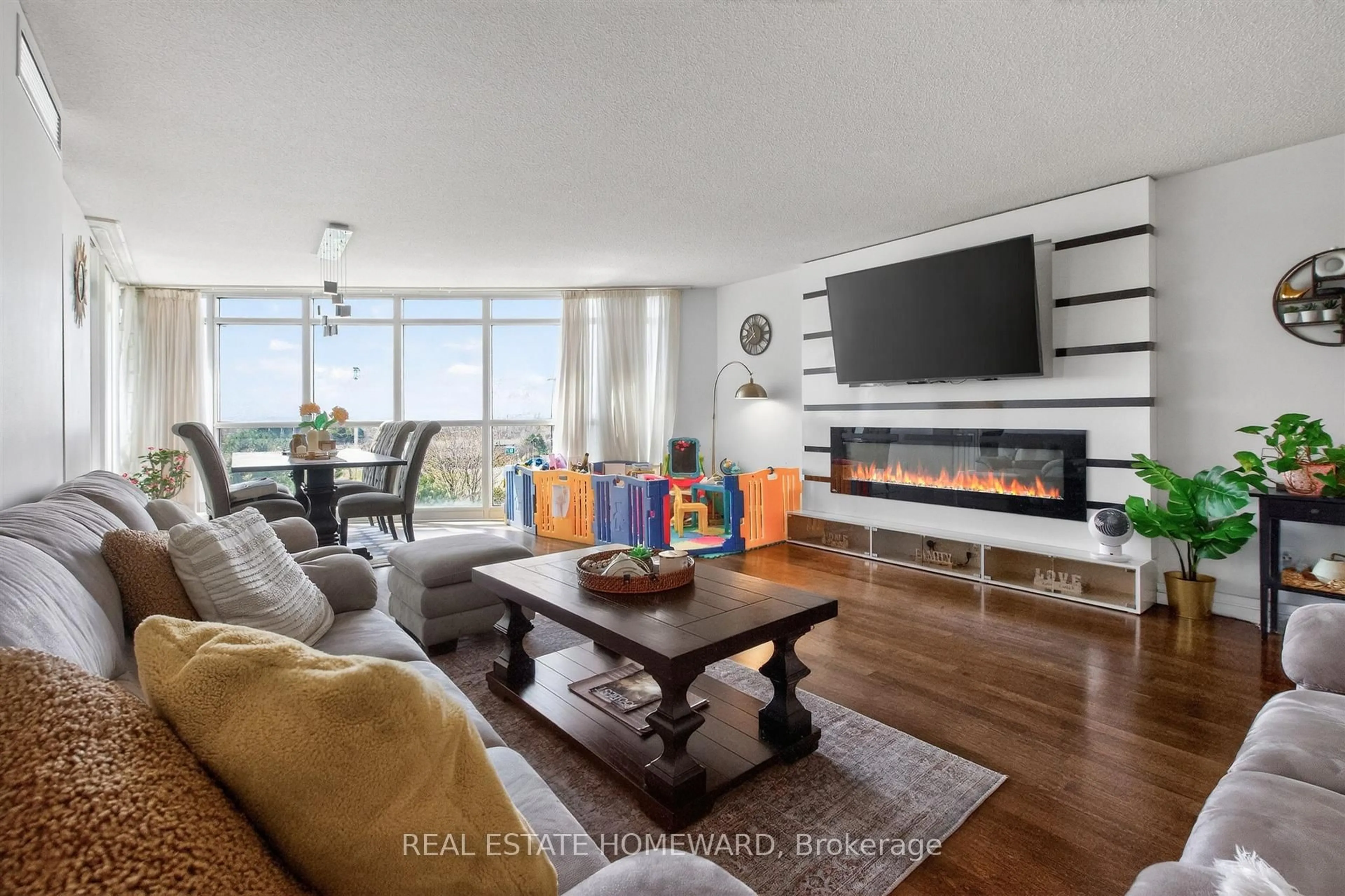 Living room with furniture, wood/laminate floor for 30 Harrison Garden Blvd #602, Toronto Ontario M2N 7A9