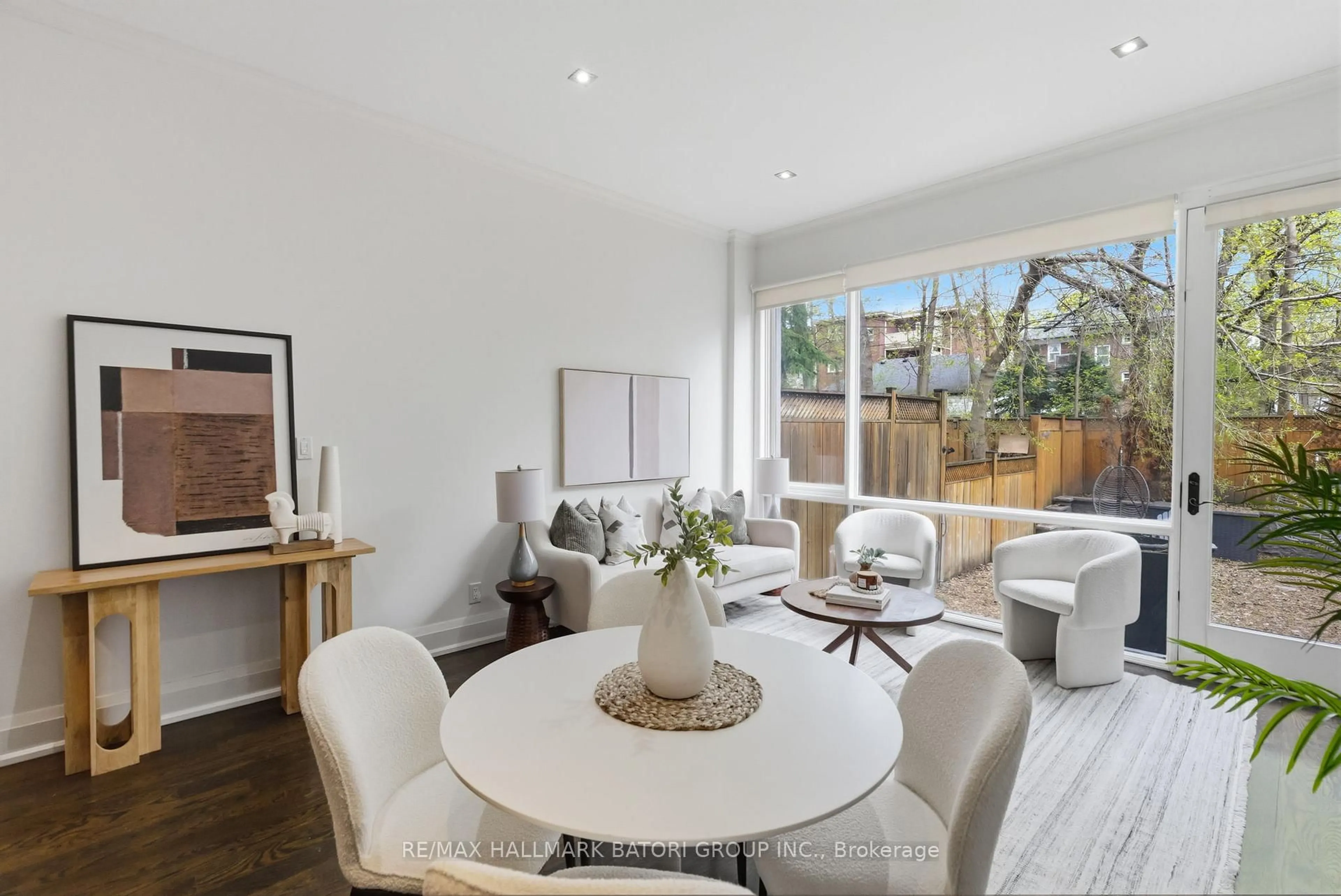 Living room with furniture, wood/laminate floor for 24A Oxton Ave, Toronto Ontario M5P 1L9