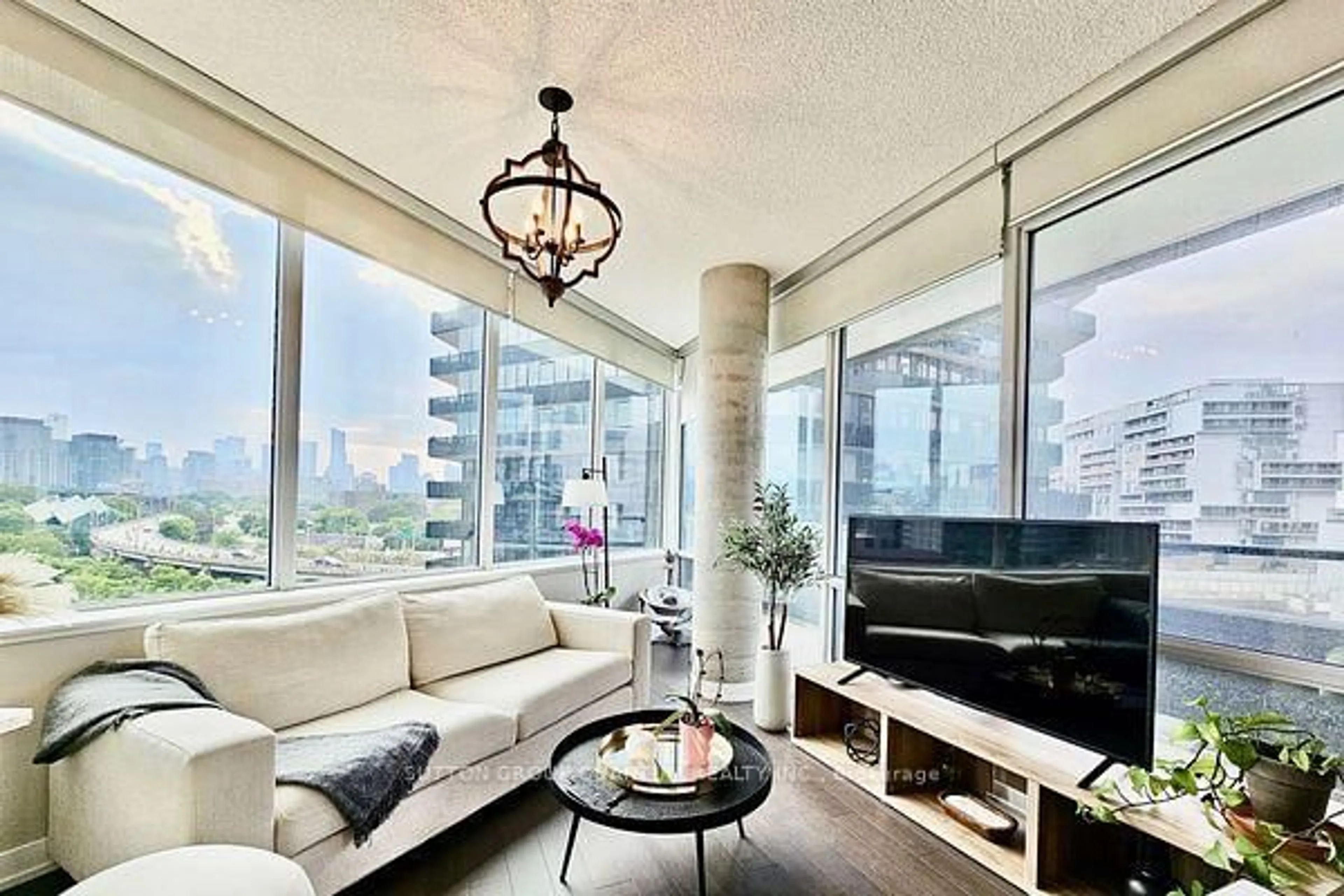 Living room with furniture, unknown for 120 Bayview Ave #N505, Toronto Ontario M5A 0G4