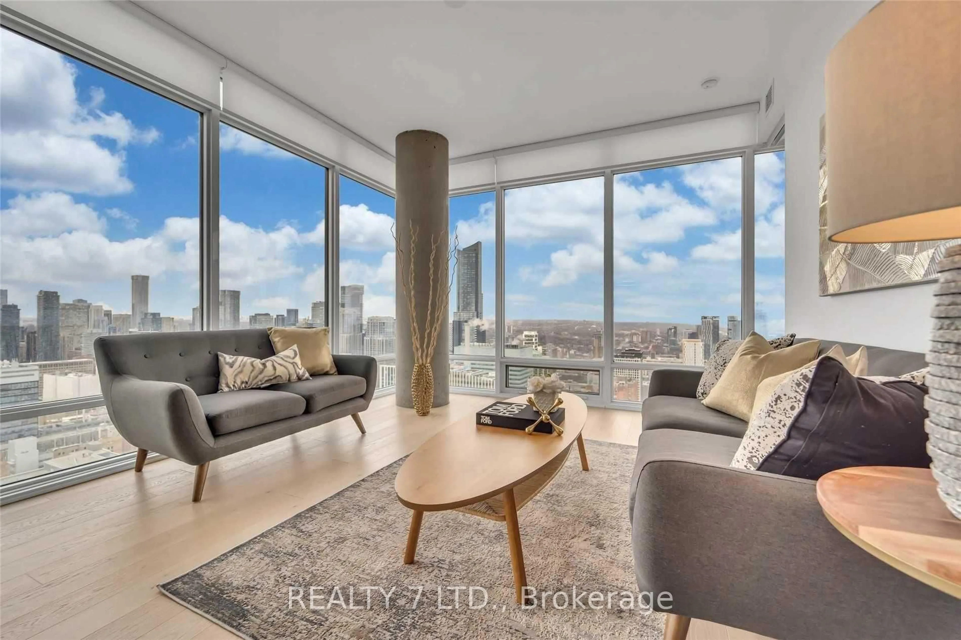 Living room with furniture, unknown for 488 University Ave #3902, Toronto Ontario M5G 0C1