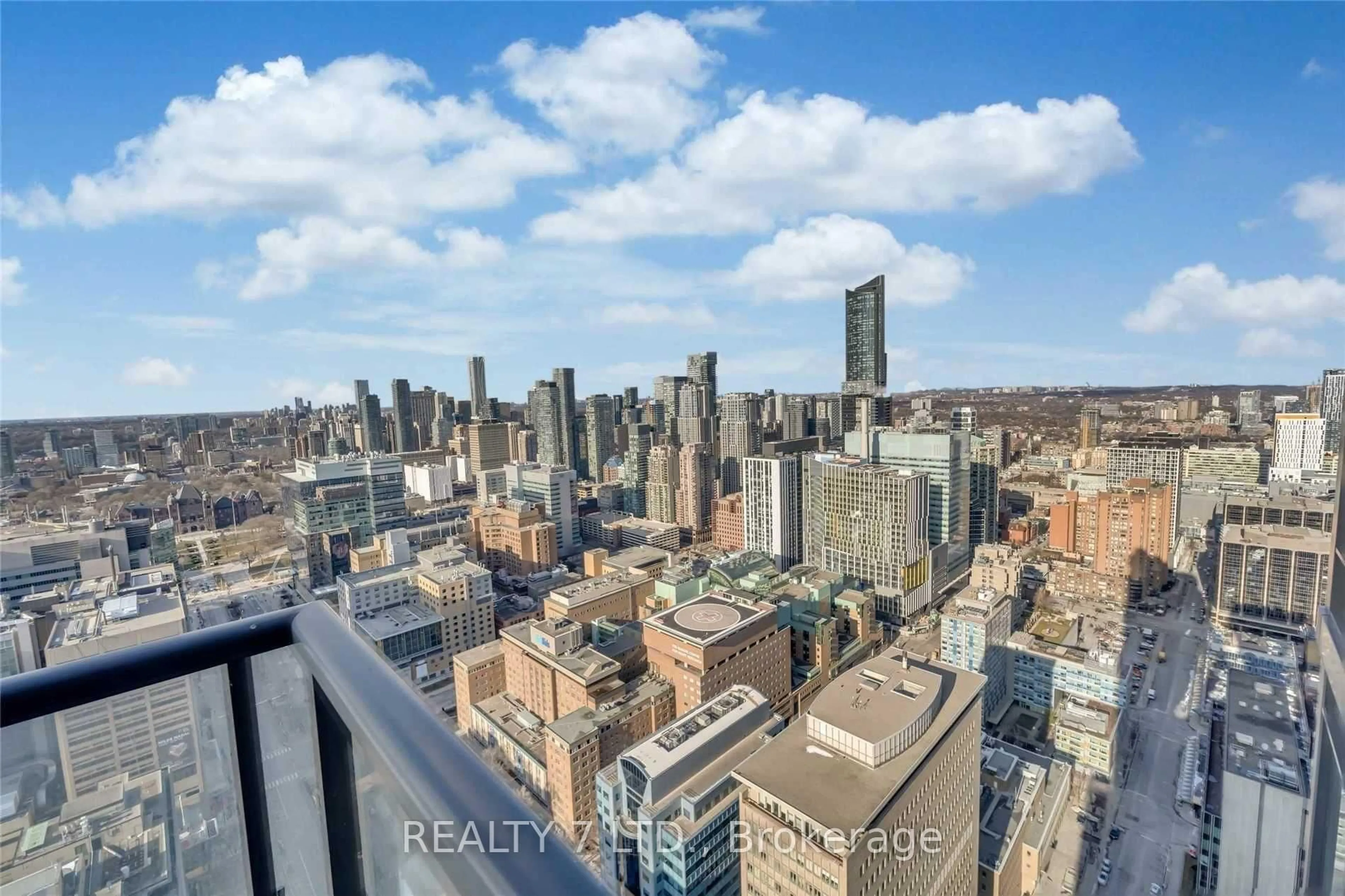 A pic from outside/outdoor area/front of a property/back of a property/a pic from drone, city buildings view from balcony for 488 University Ave #3902, Toronto Ontario M5G 0C1