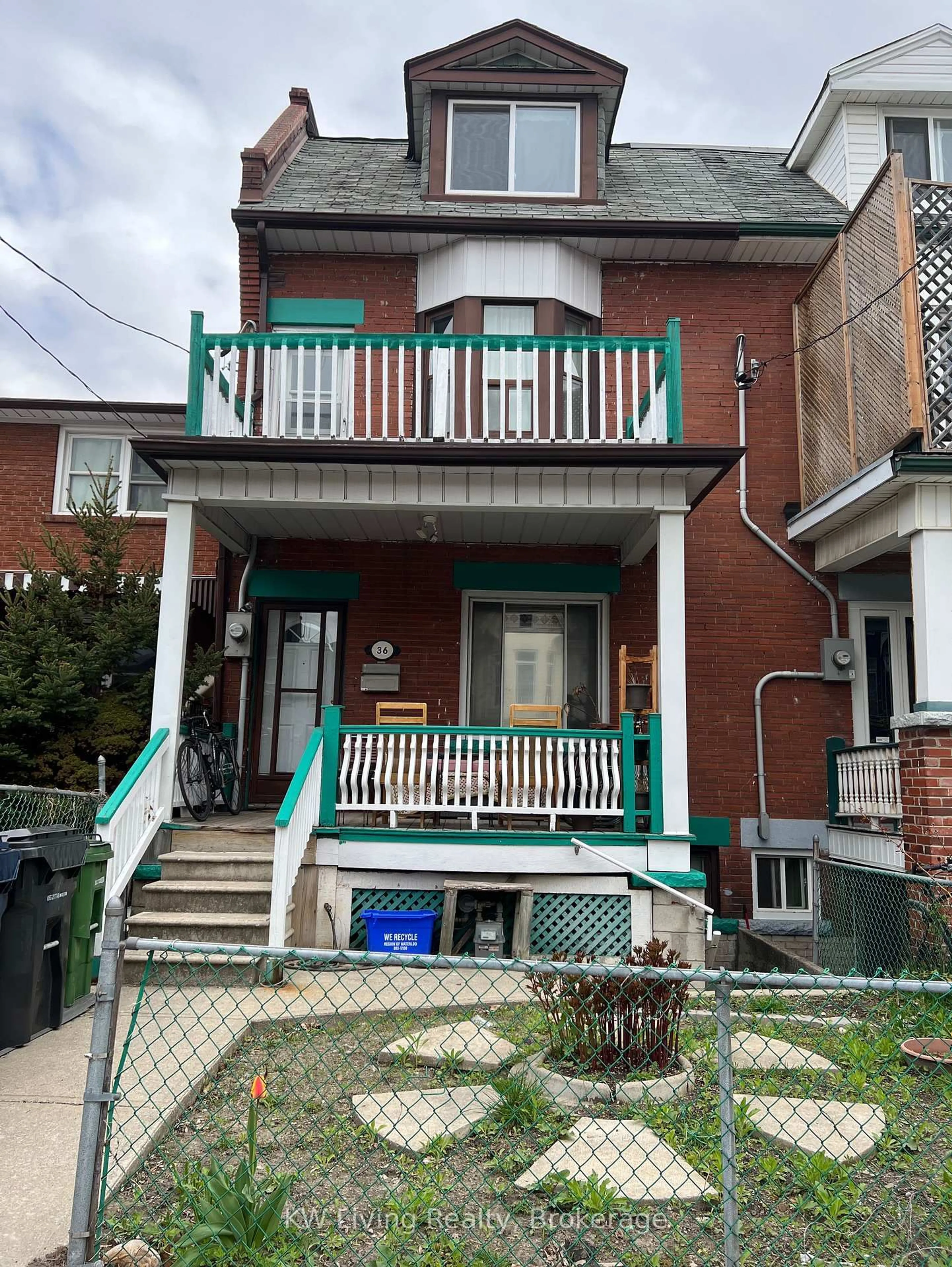 Home with brick exterior material, street for 36 Nassau St, Toronto Ontario M5T 1M2