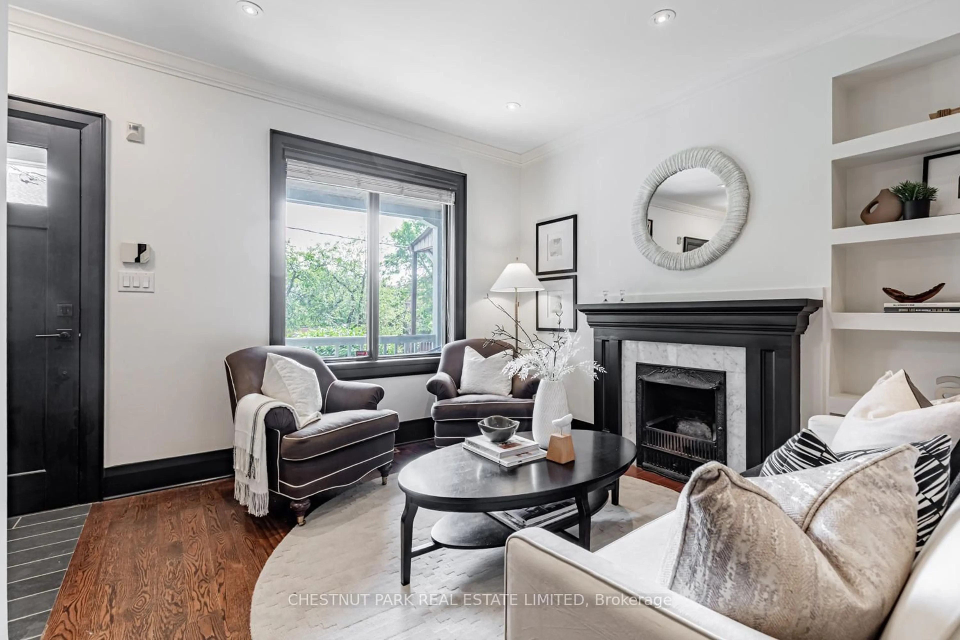 Living room with furniture, wood/laminate floor for 244 Cottingham St, Toronto Ontario M4V 1C6
