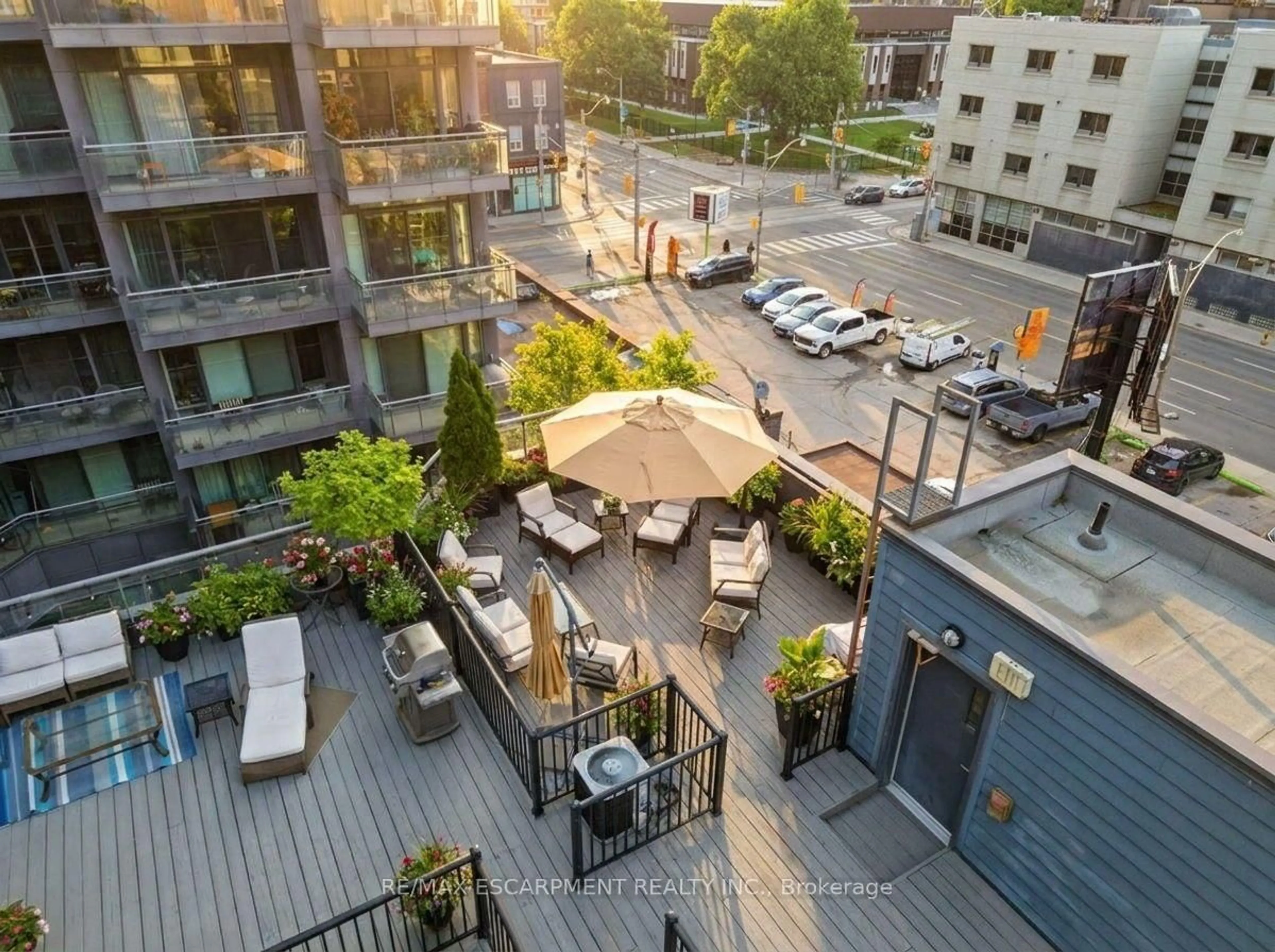 Patio, city buildings view from balcony for 127 Queen St #TH1, Toronto Ontario M5C 1S3