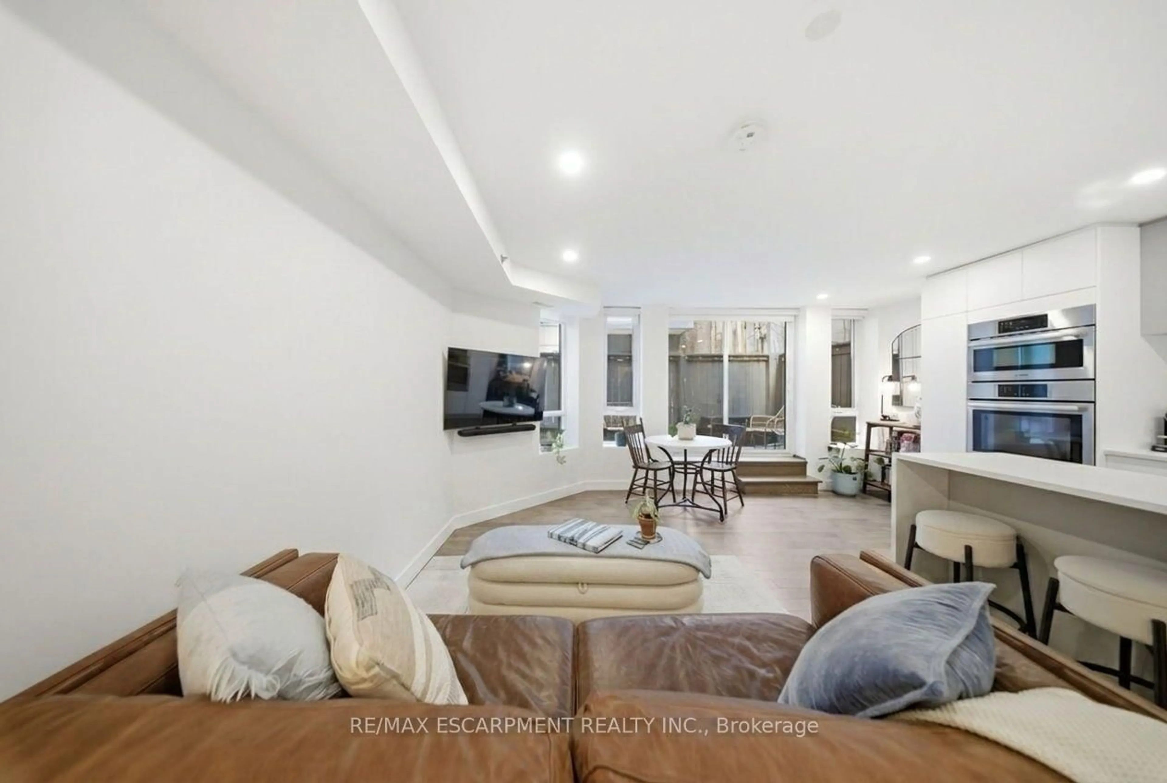 Living room with furniture, unknown for 127 Queen St #TH1, Toronto Ontario M5C 1S3