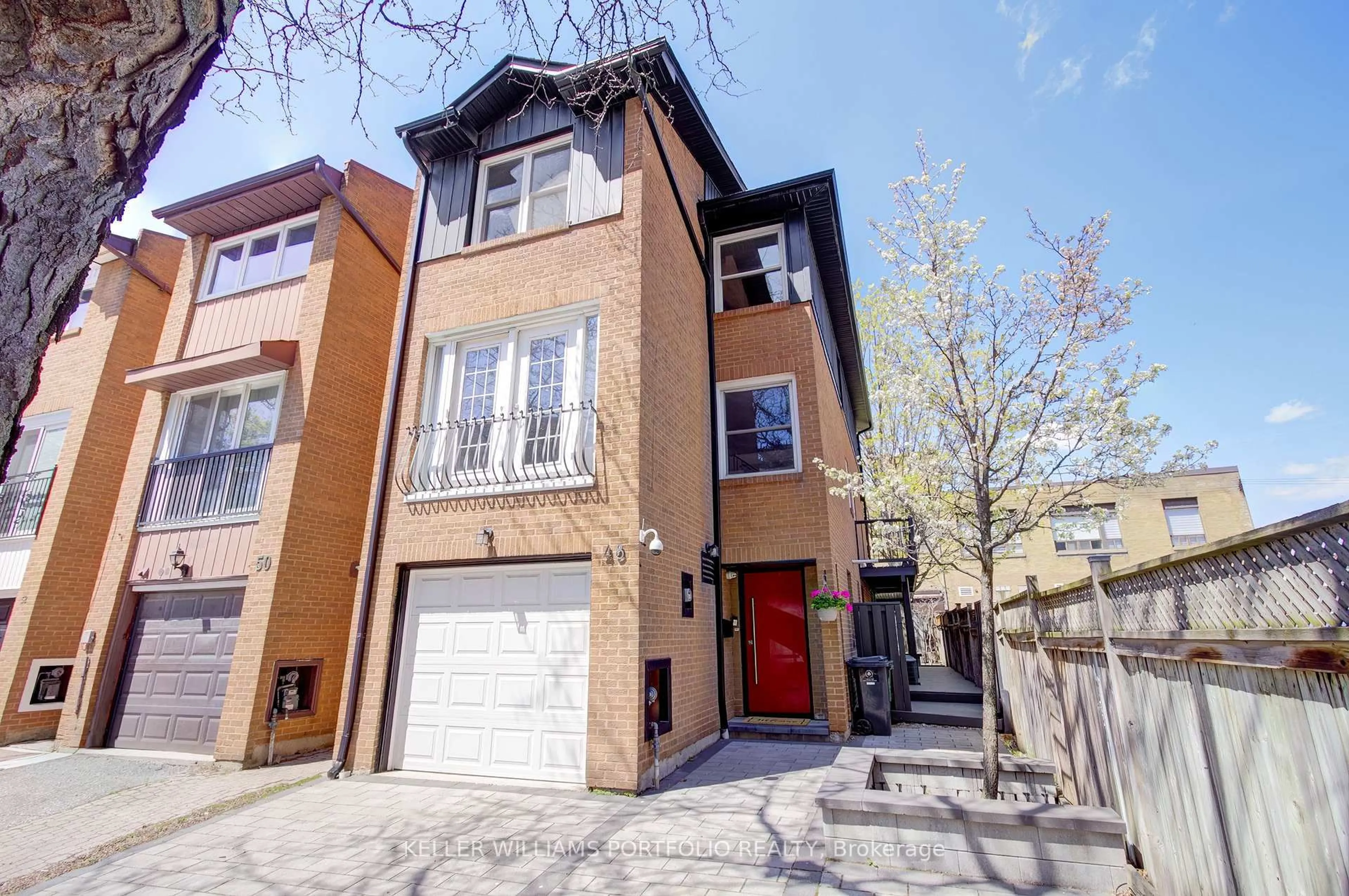 Home with brick exterior material, street for 48 Michener Crt, Toronto Ontario M6J 3R6