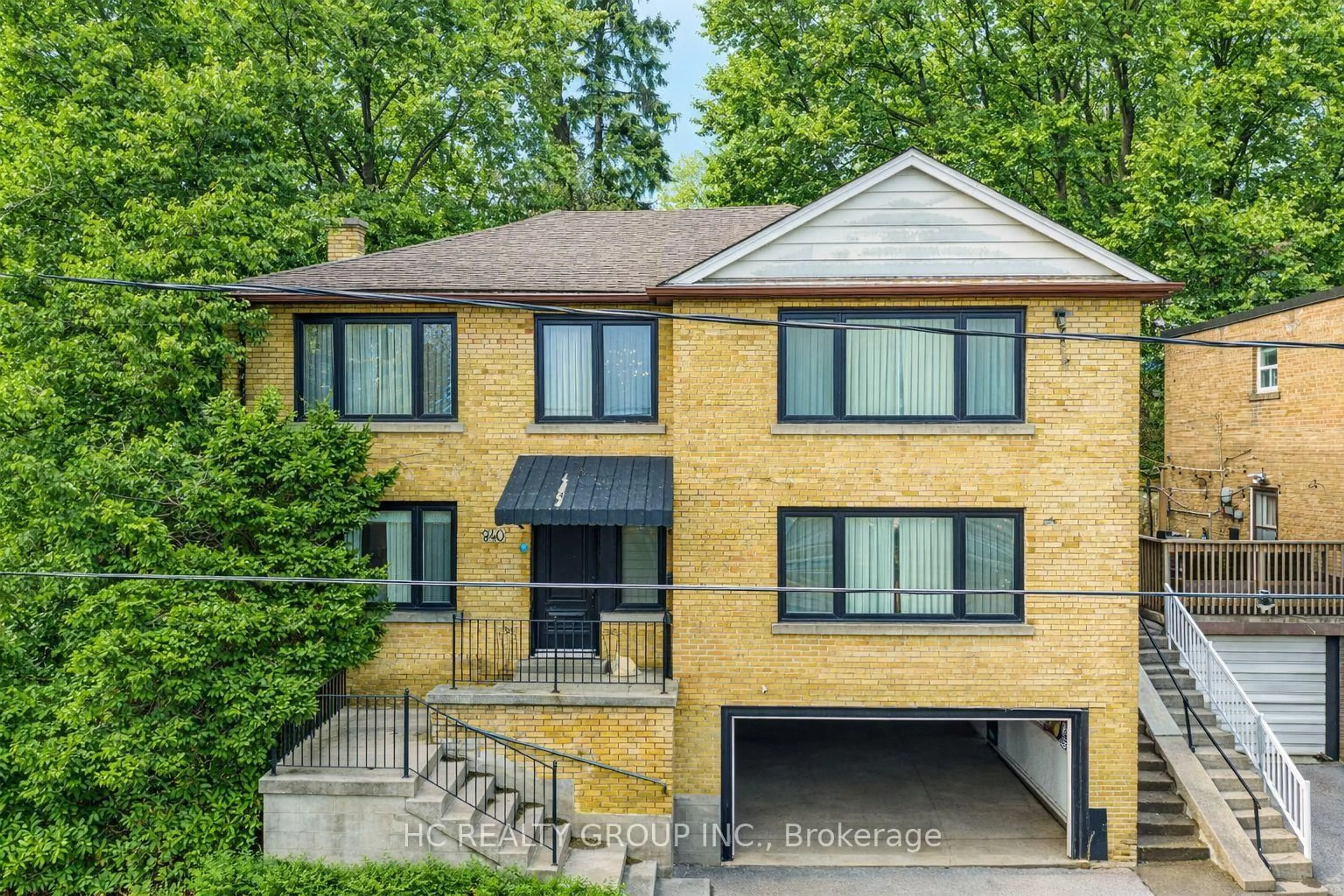 Home with brick exterior material, street for 840 Davenport Rd, Toronto Ontario M6G 2B6