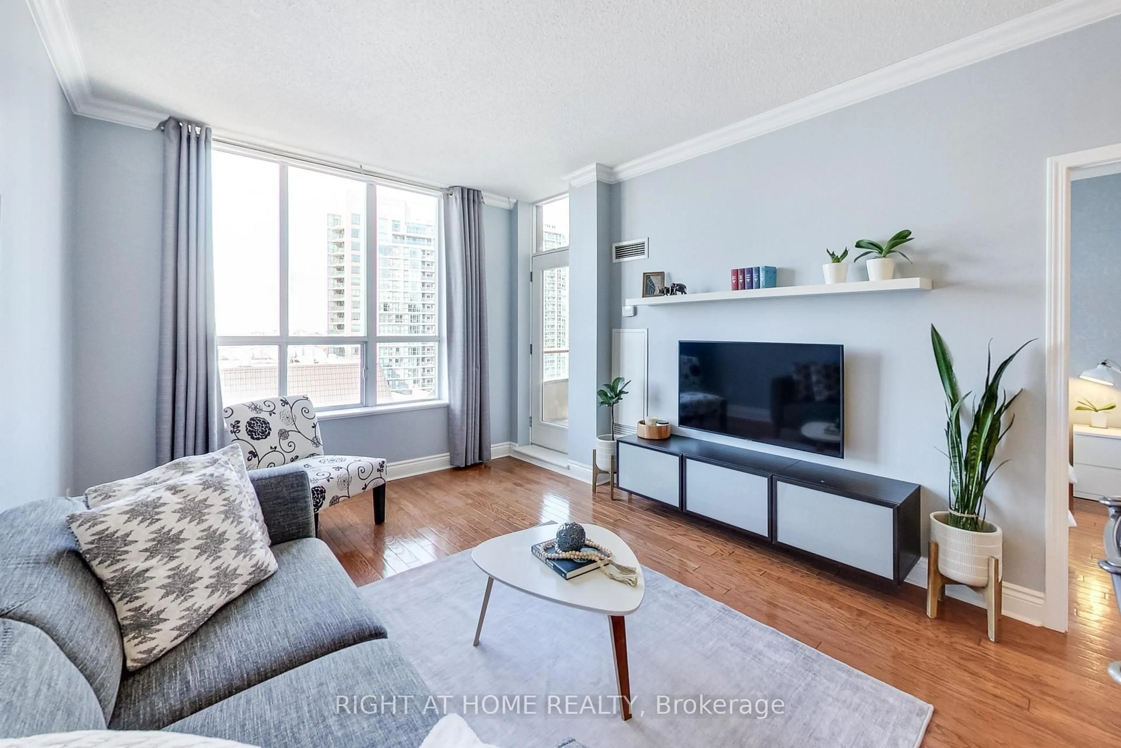 Living room with furniture, wood/laminate floor for 55 Harrison Garden Blvd #Ph6, Toronto Ontario M2N 7G3