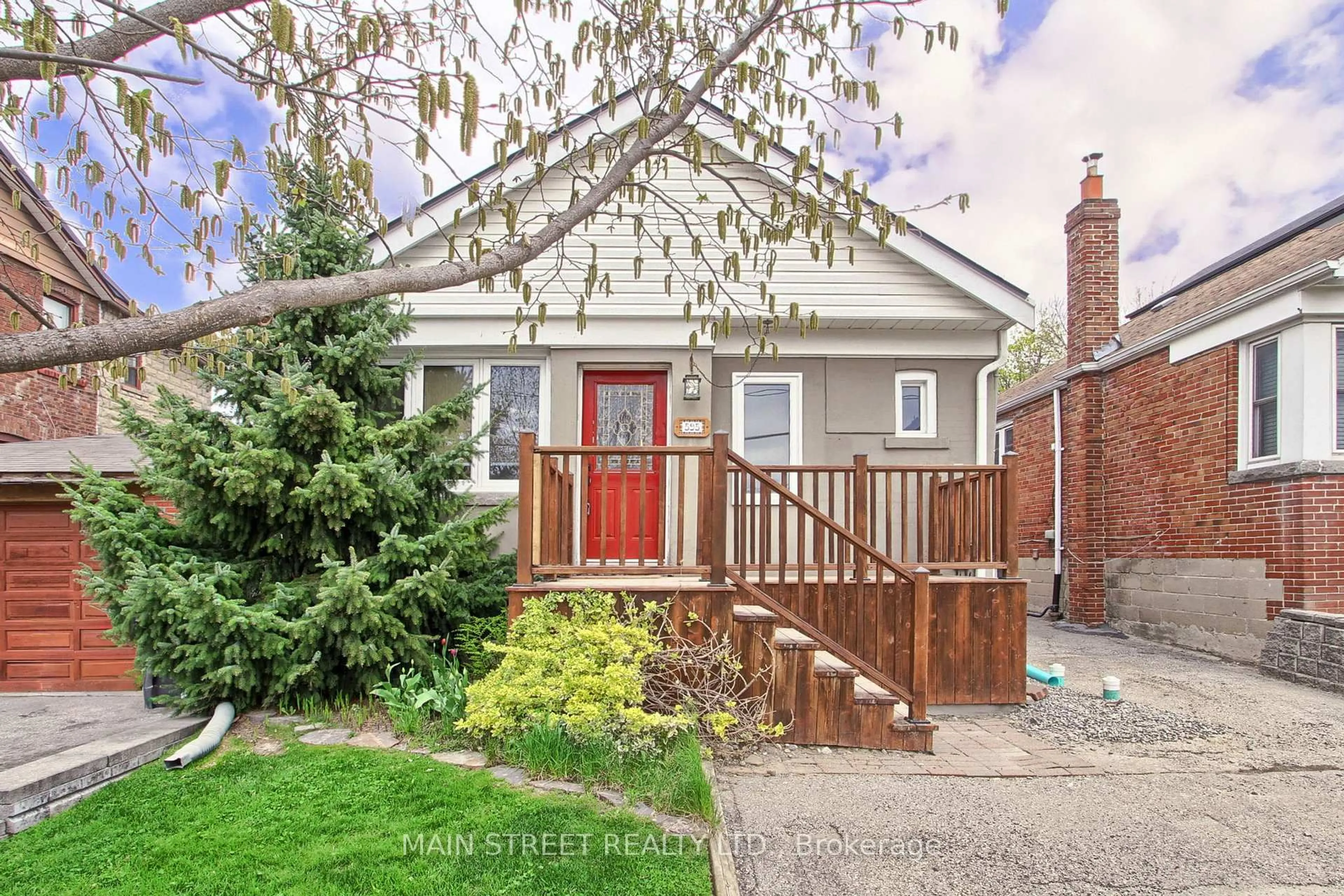 Home with brick exterior material, street for 595 Northcliffe Blvd, Toronto Ontario M6E 3L6
