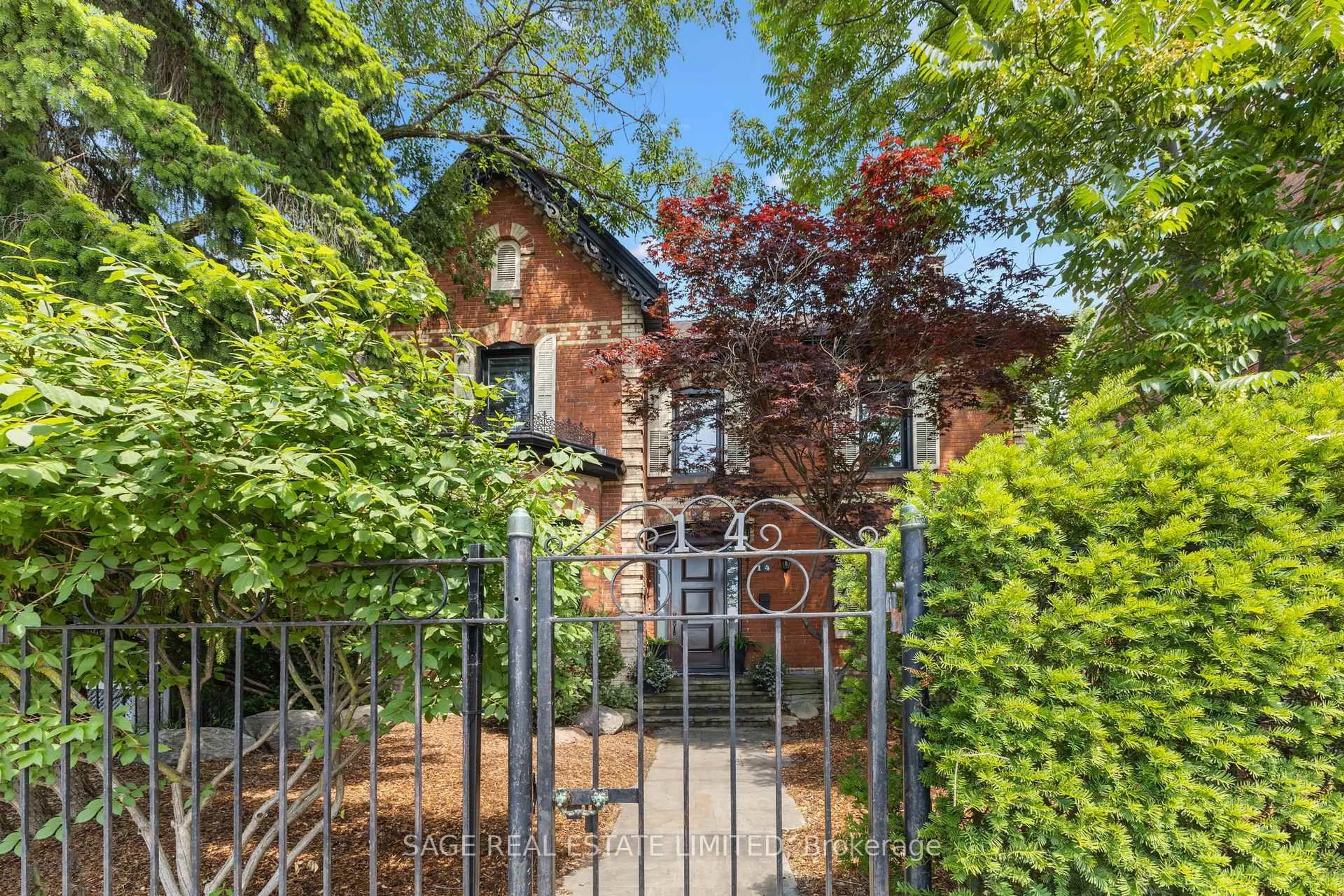 Home with brick exterior material, street for 14 Halton St, Toronto Ontario M6J 1R3