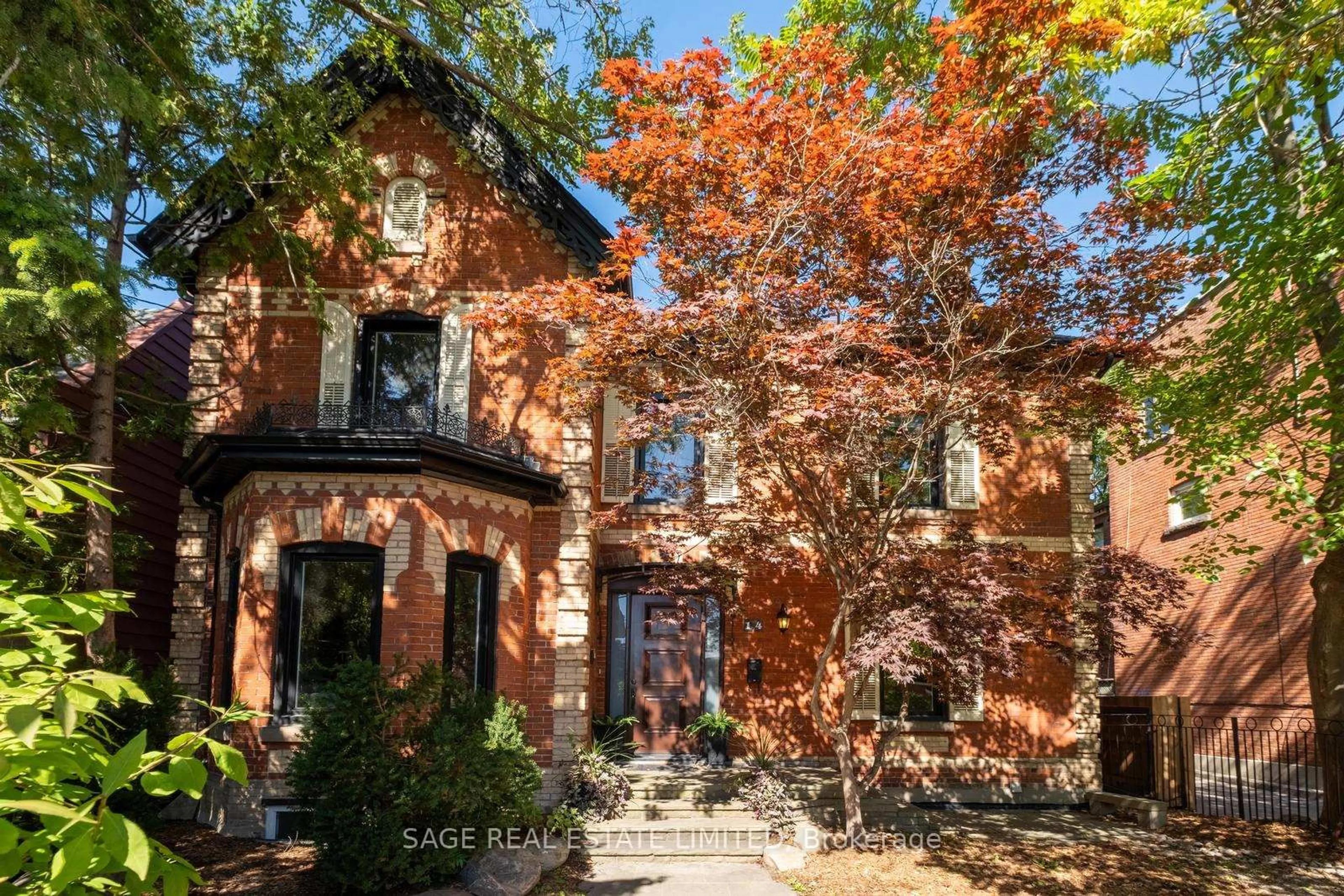 Home with brick exterior material, street for 14 Halton St, Toronto Ontario M6J 1R3