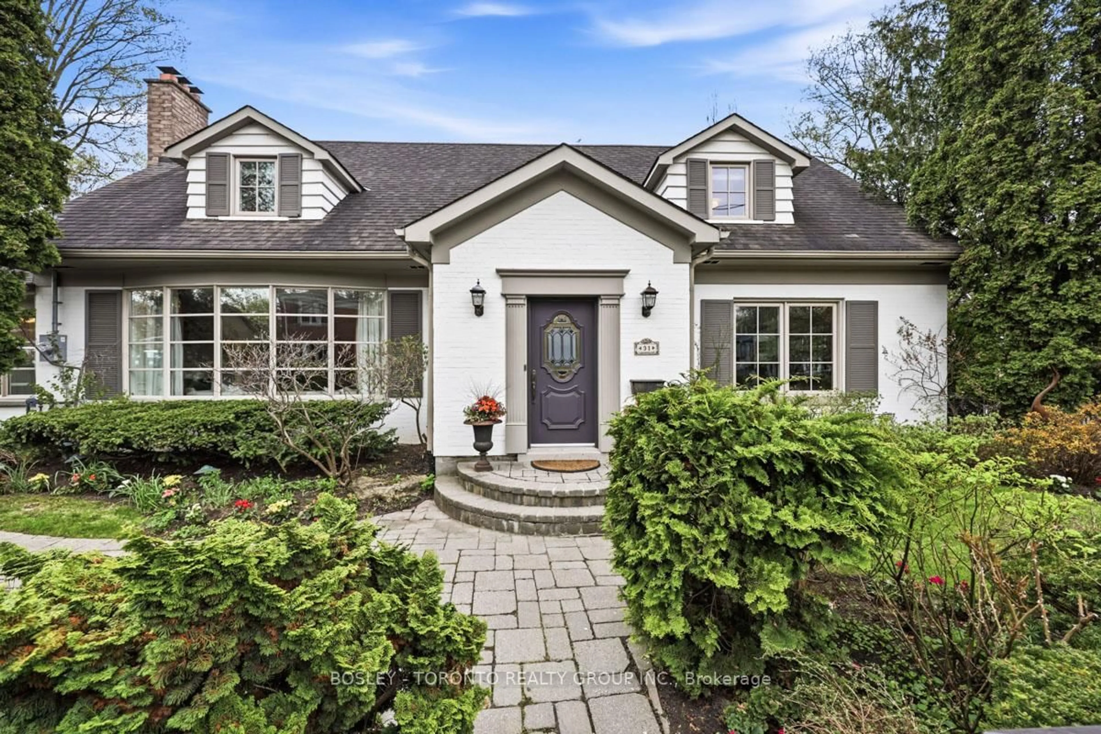 Home with brick exterior material, street for 31 Caribou Rd, Toronto Ontario M5N 2A4