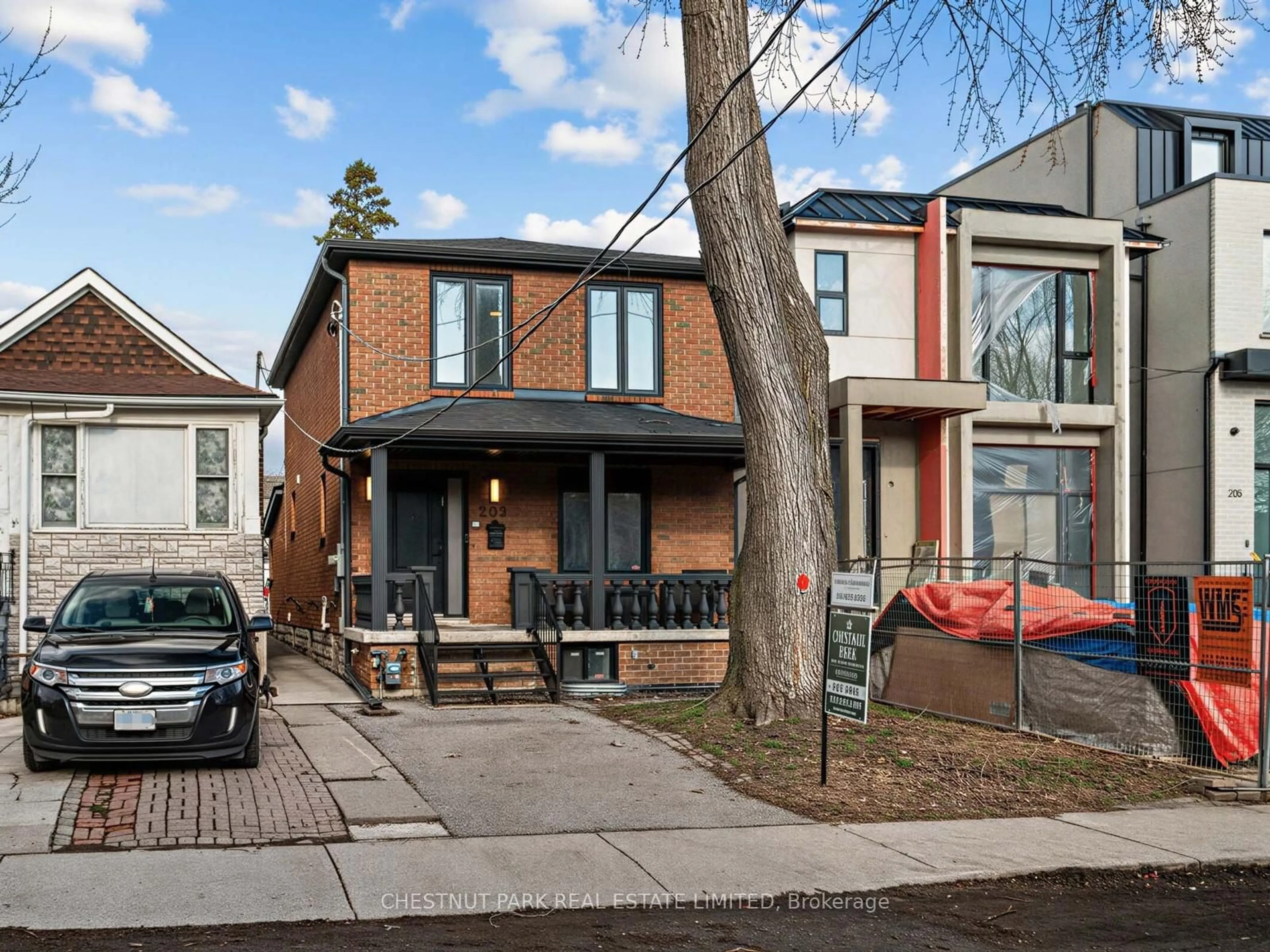 Home with brick exterior material, street for 209 Robina Ave, Toronto Ontario M6C 3Y9