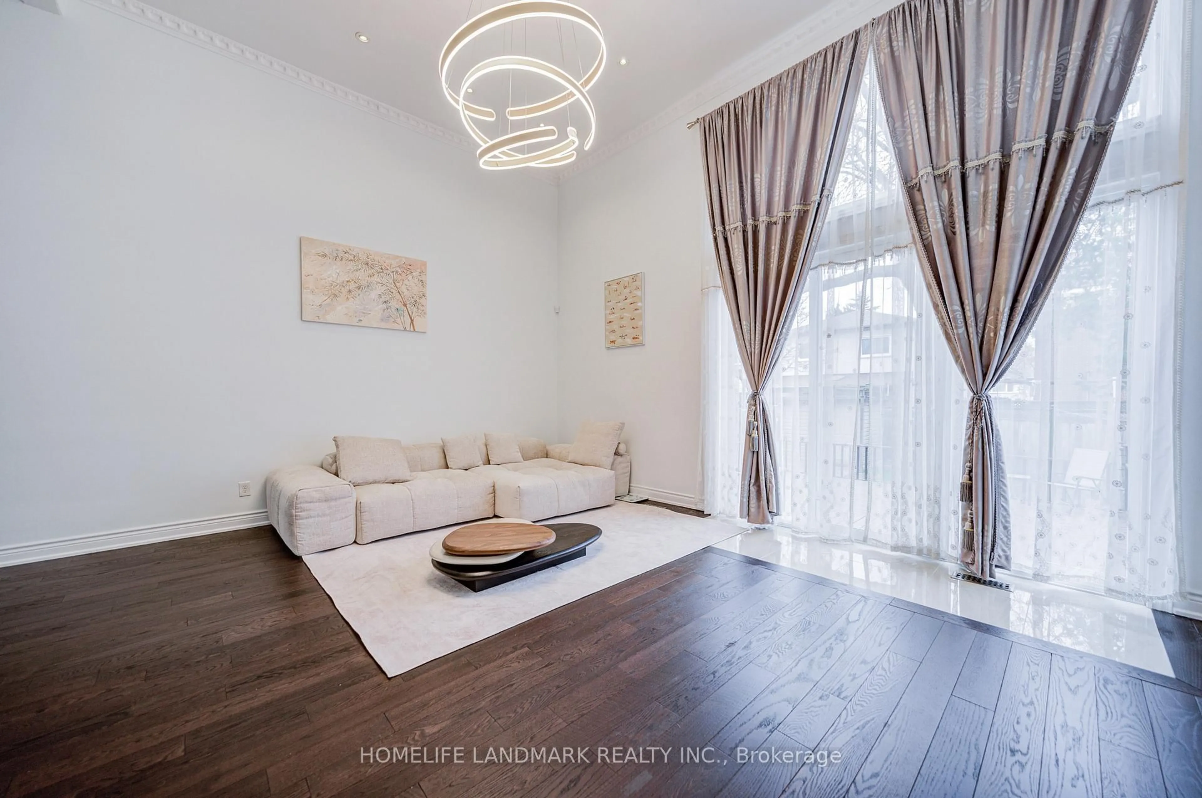 Living room with furniture, wood/laminate floor for 53 Chipwood Cres, Toronto Ontario M2J 3X6