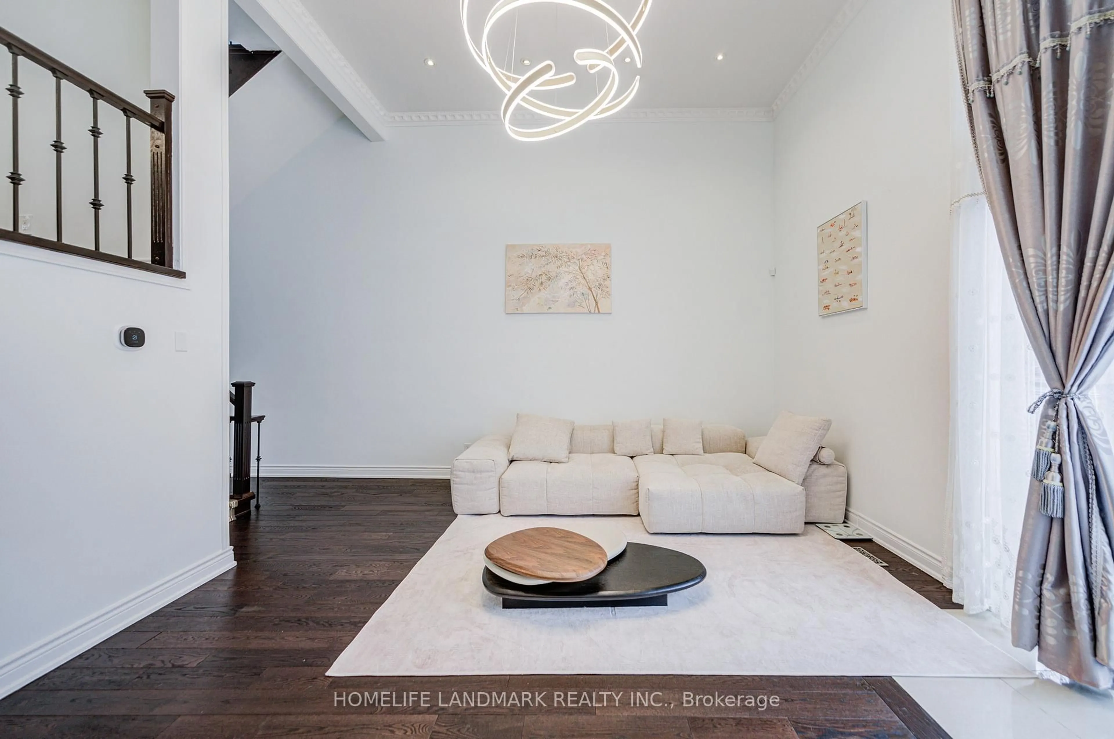 Living room with furniture, wood/laminate floor for 53 Chipwood Cres, Toronto Ontario M2J 3X6