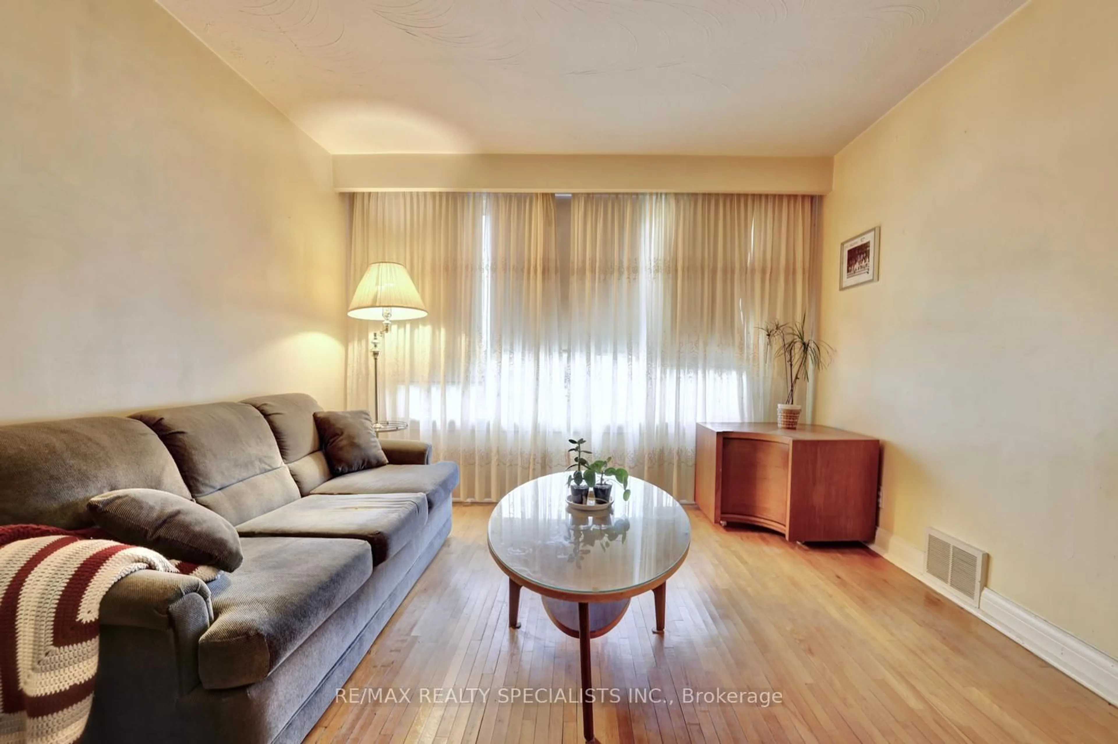 Living room with furniture, wood/laminate floor for 54 Marmion Ave, Toronto Ontario M5M 1Y1