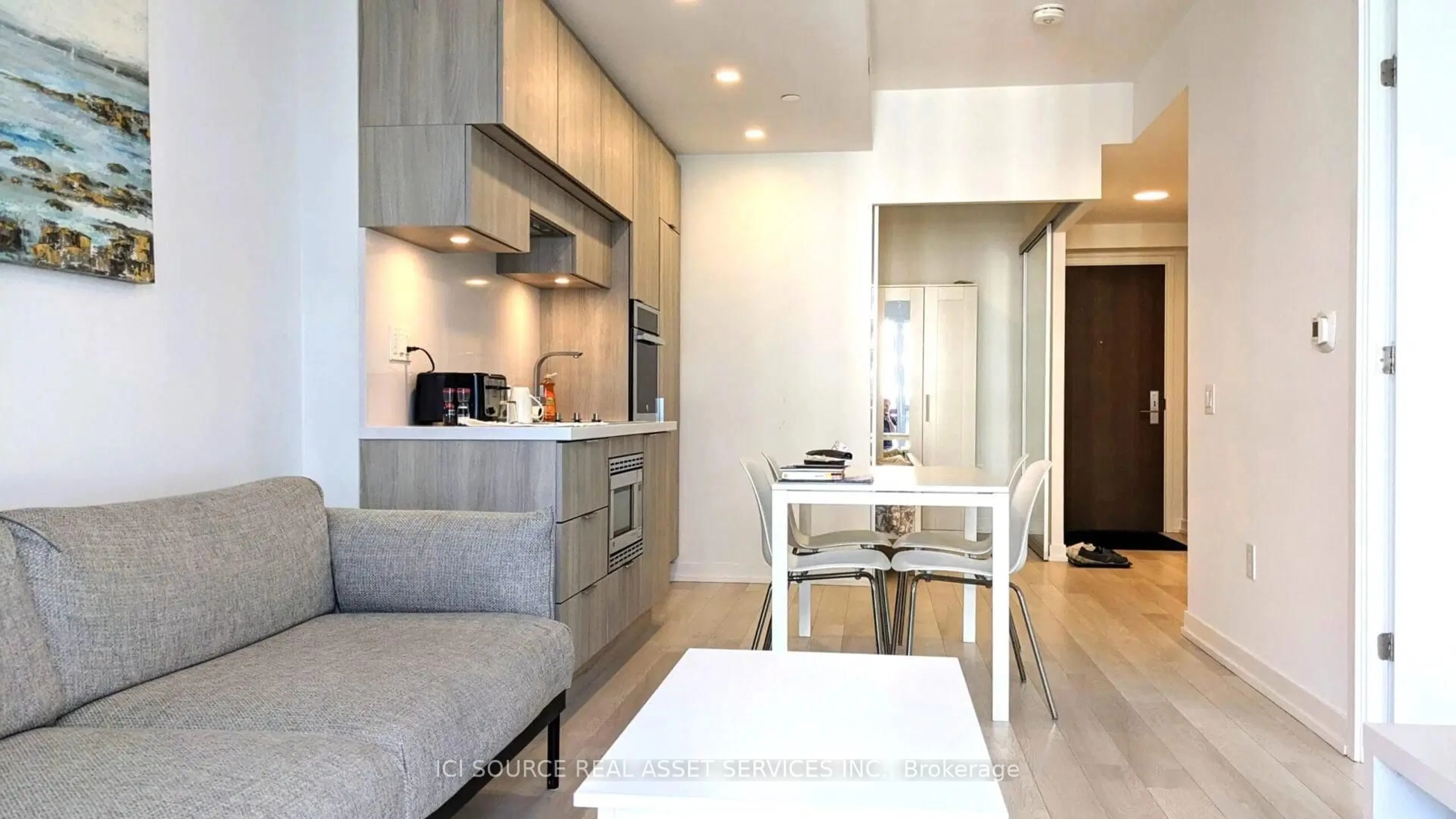Open concept kitchen, wood/laminate floor for 39 Roehampton Ave #3210, Toronto Ontario M4P 0G1