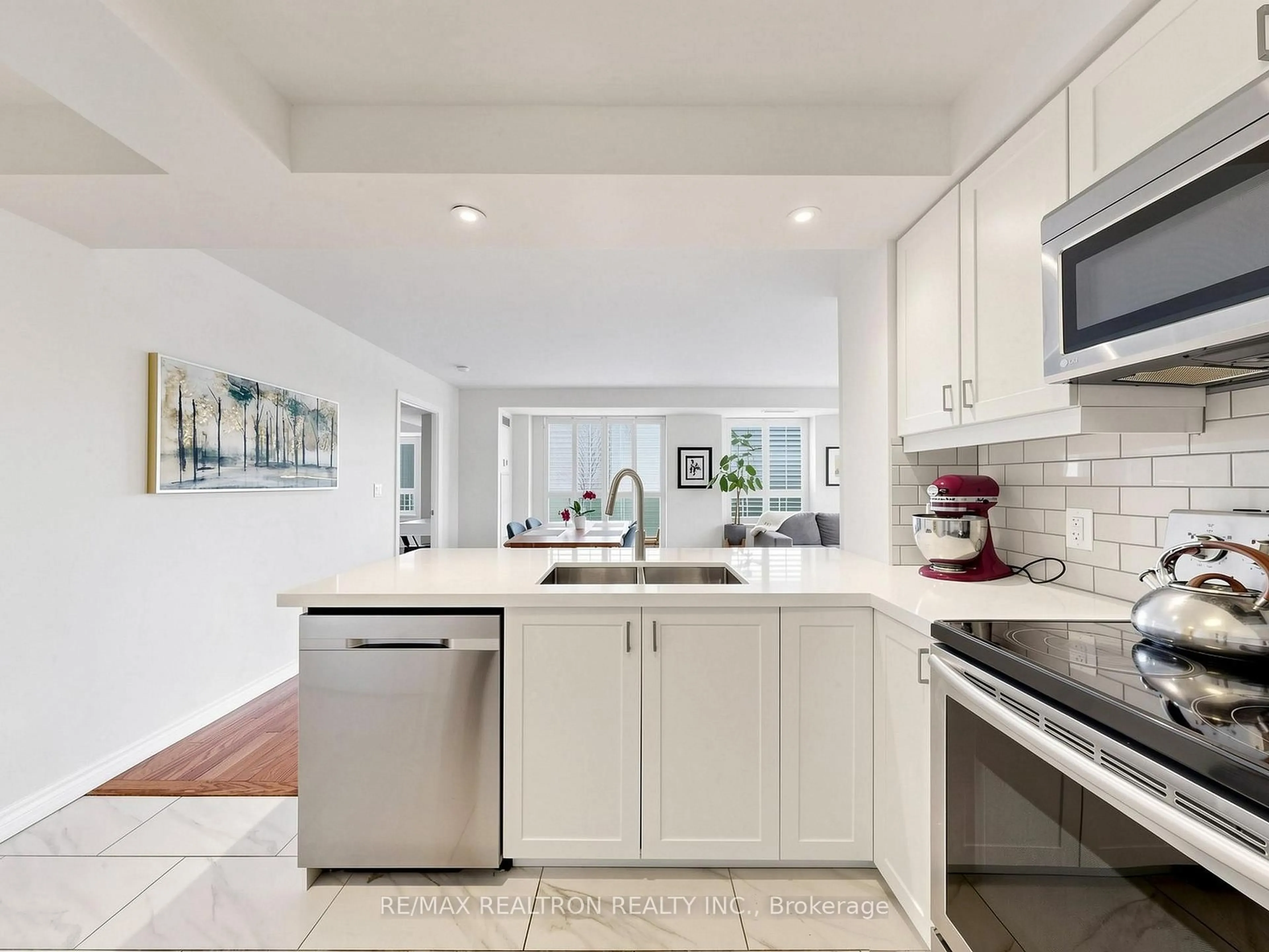 Open concept kitchen, ceramic/tile floor for 16 Dallimore Circ #414, Toronto Ontario M3C 4C4