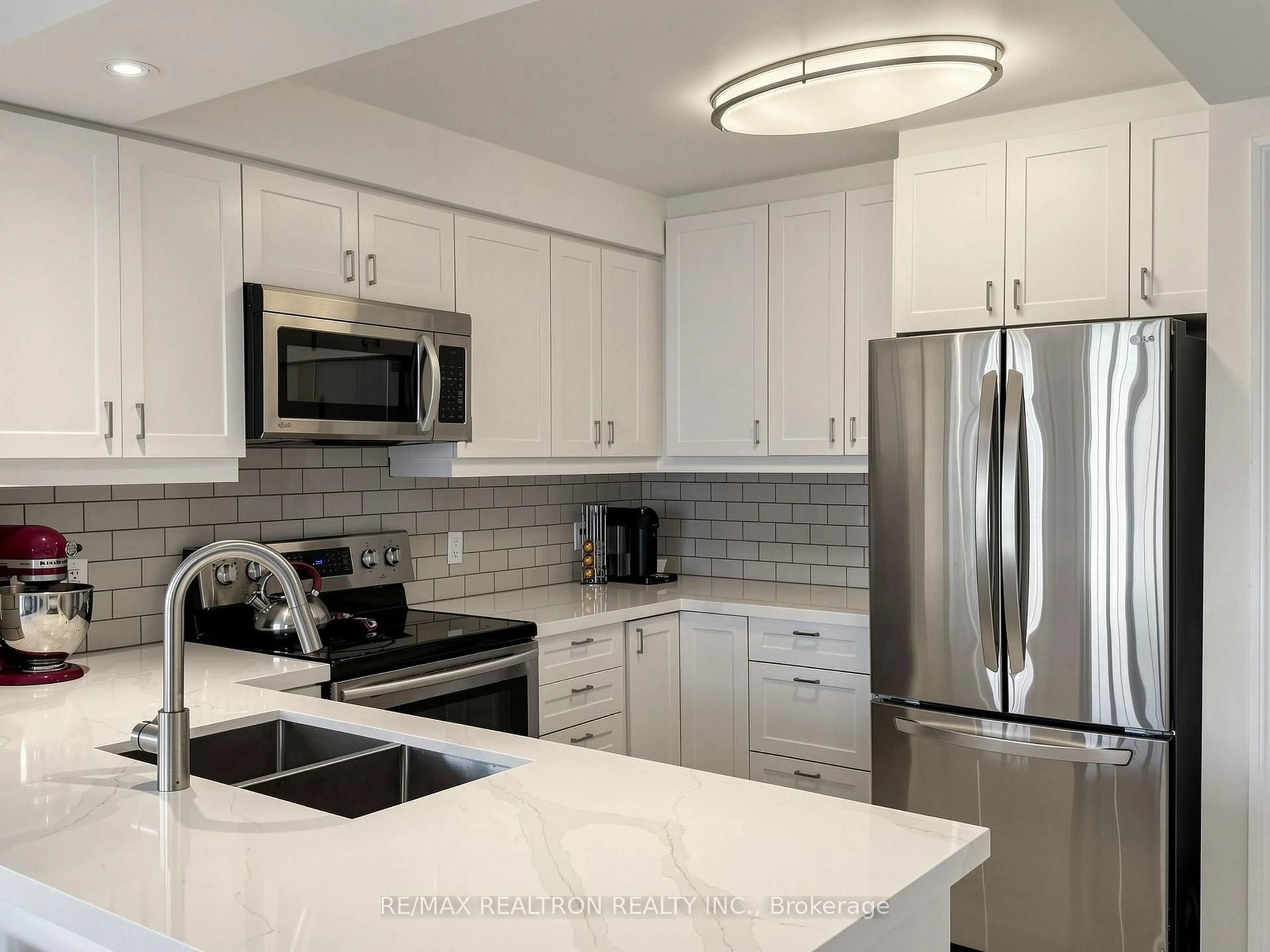 Contemporary kitchen, ceramic/tile floor for 16 Dallimore Circ #414, Toronto Ontario M3C 4C4