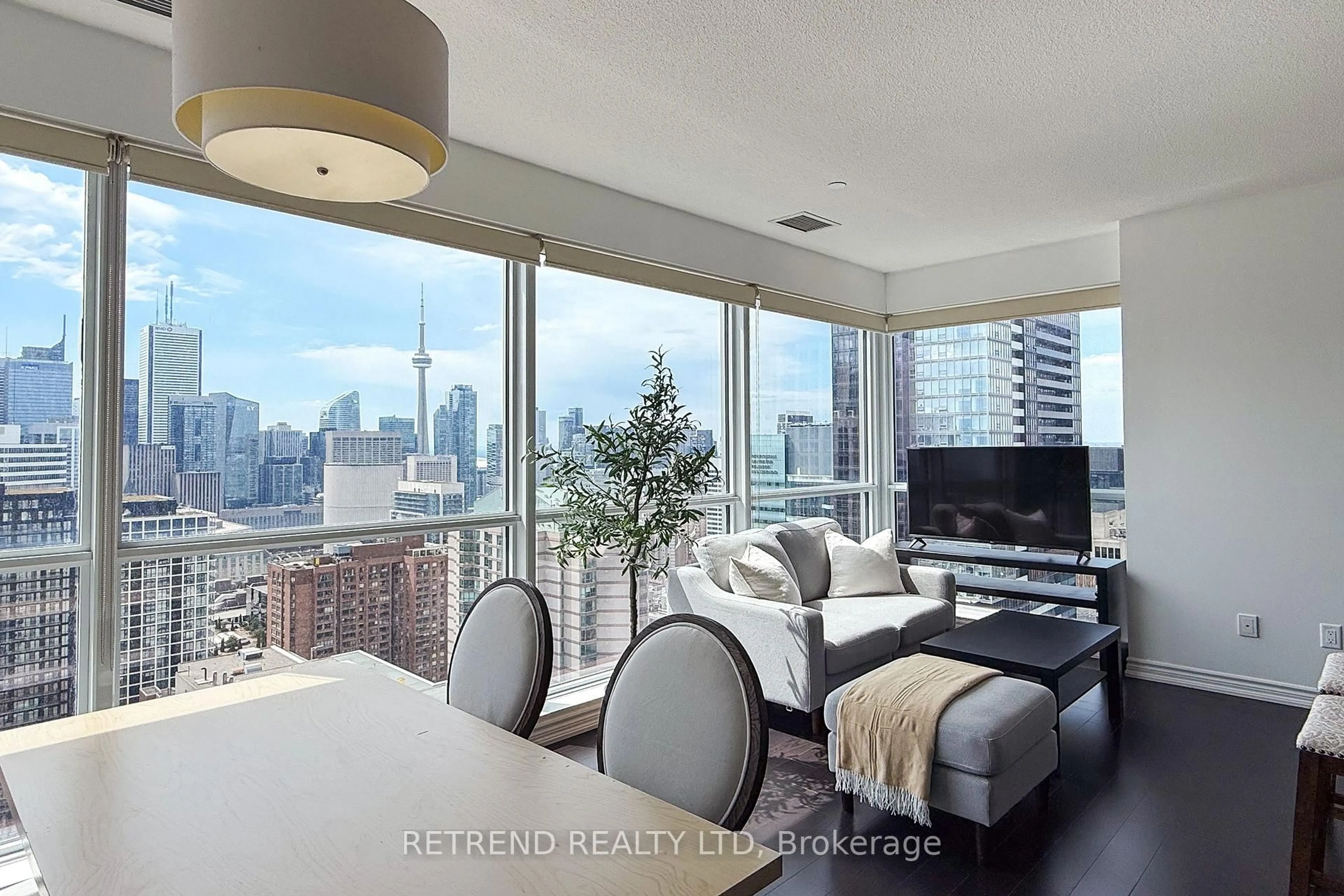 Living room with furniture, wood/laminate floor for 386 Yonge St #3510, Toronto Ontario M5B 0A5