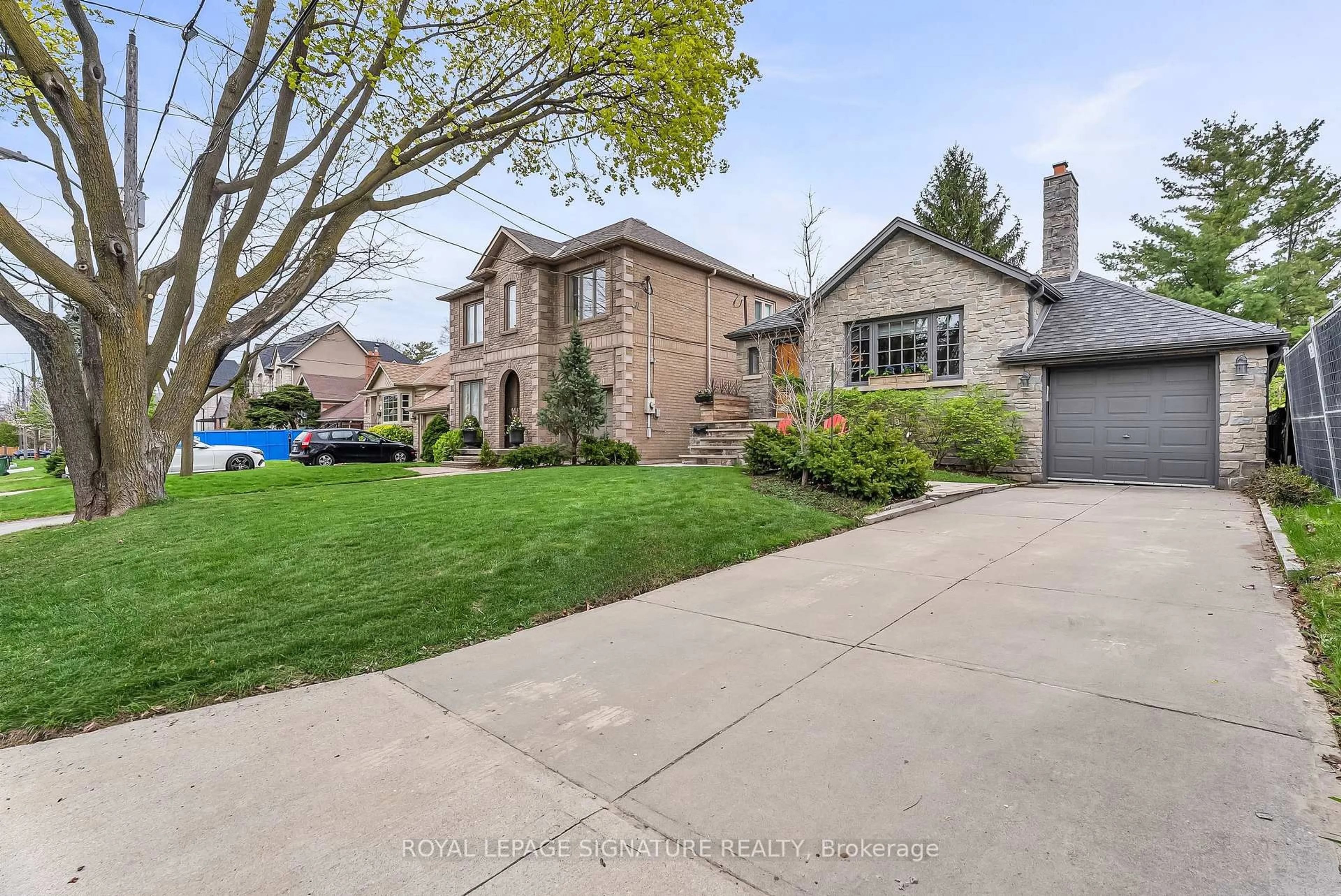 Home with brick exterior material, street for 31 Burncrest Dr, Toronto Ontario M5M 2Z2