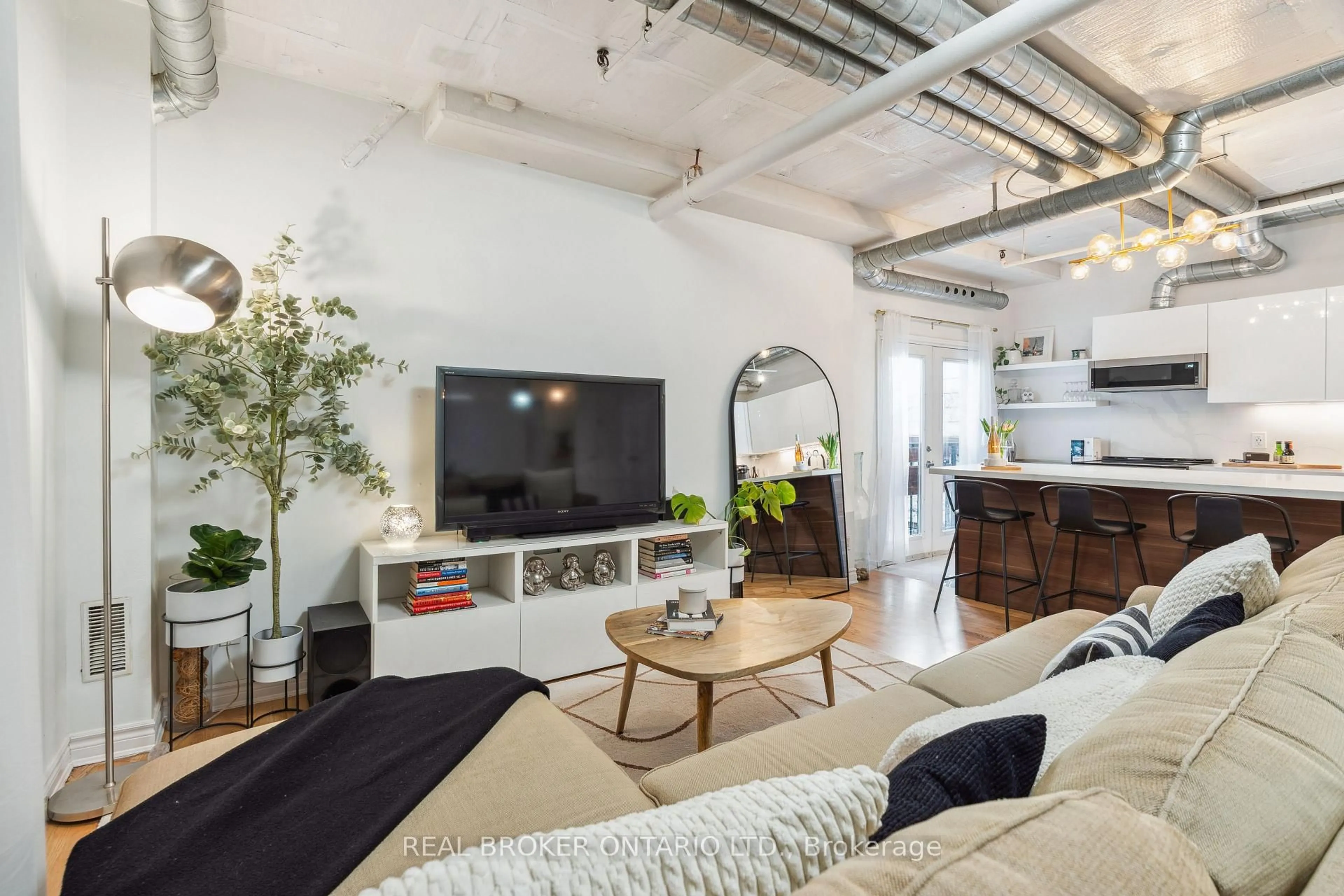 Living room with furniture, cement floor for 78 St Patrick St #146, Toronto Ontario M5T 3K8