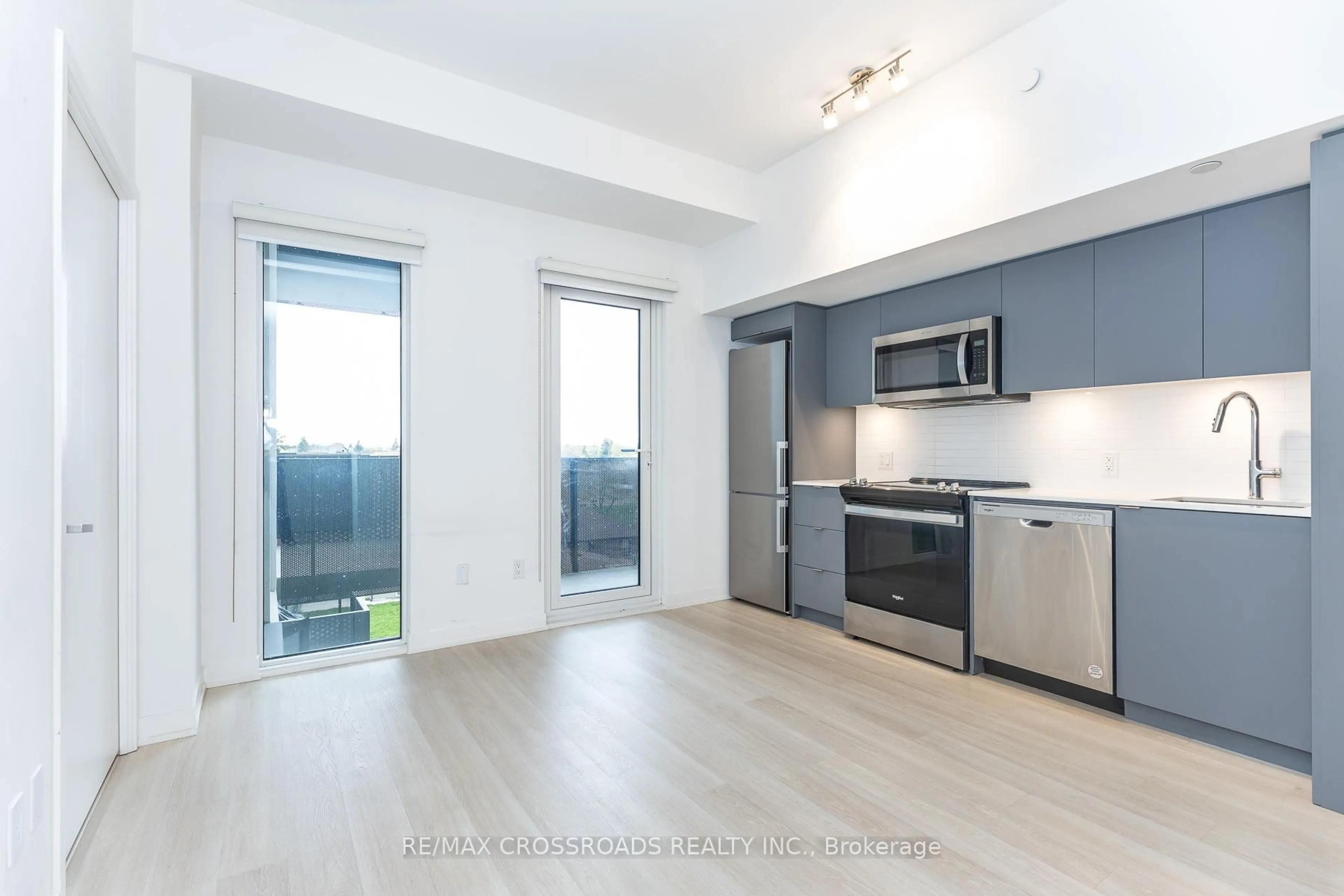Open concept kitchen, wood/laminate floor for 500 Wilson Ave #550, Toronto Ontario M3H 0E5